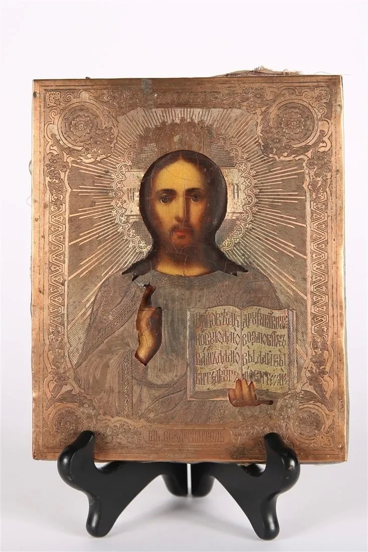 ANTIQUE EARLY RUSSIAN ICON CHRIST 1890: "Christ Pantocrator". Copper, oil on board, 1890. Height: 7", Length: 5 3/4", Depth: 3/4". Copper riza, painted face and hands of Christ. Backed in fabric.--From the Estate of Barbara Kanash art deale