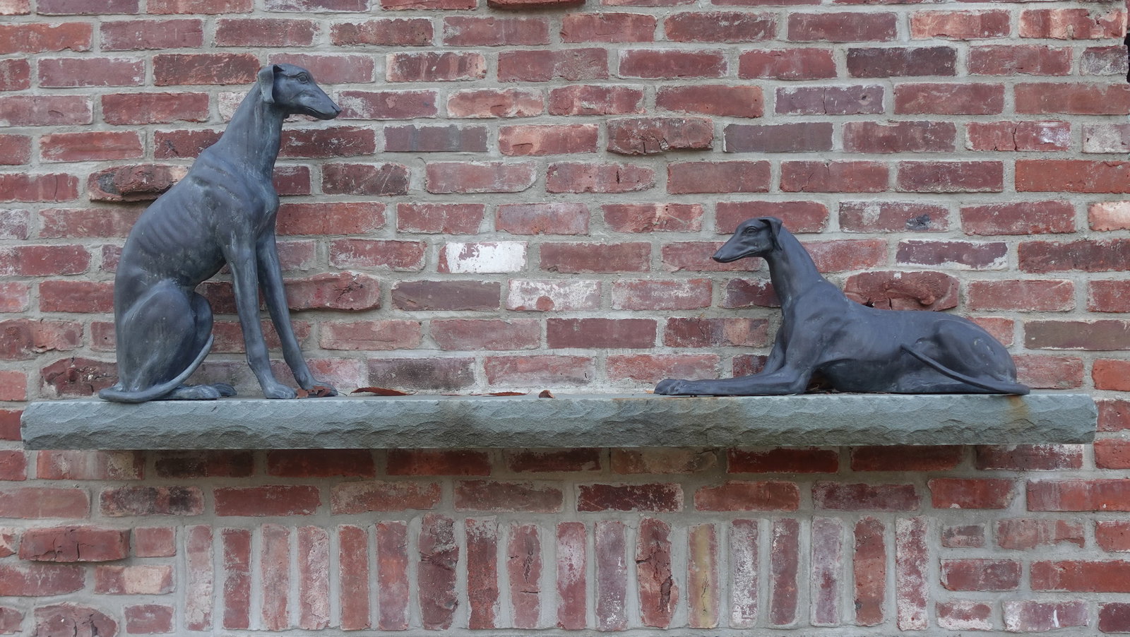 TWO LARGE BRONZE DOG STATUES (1 of 7)