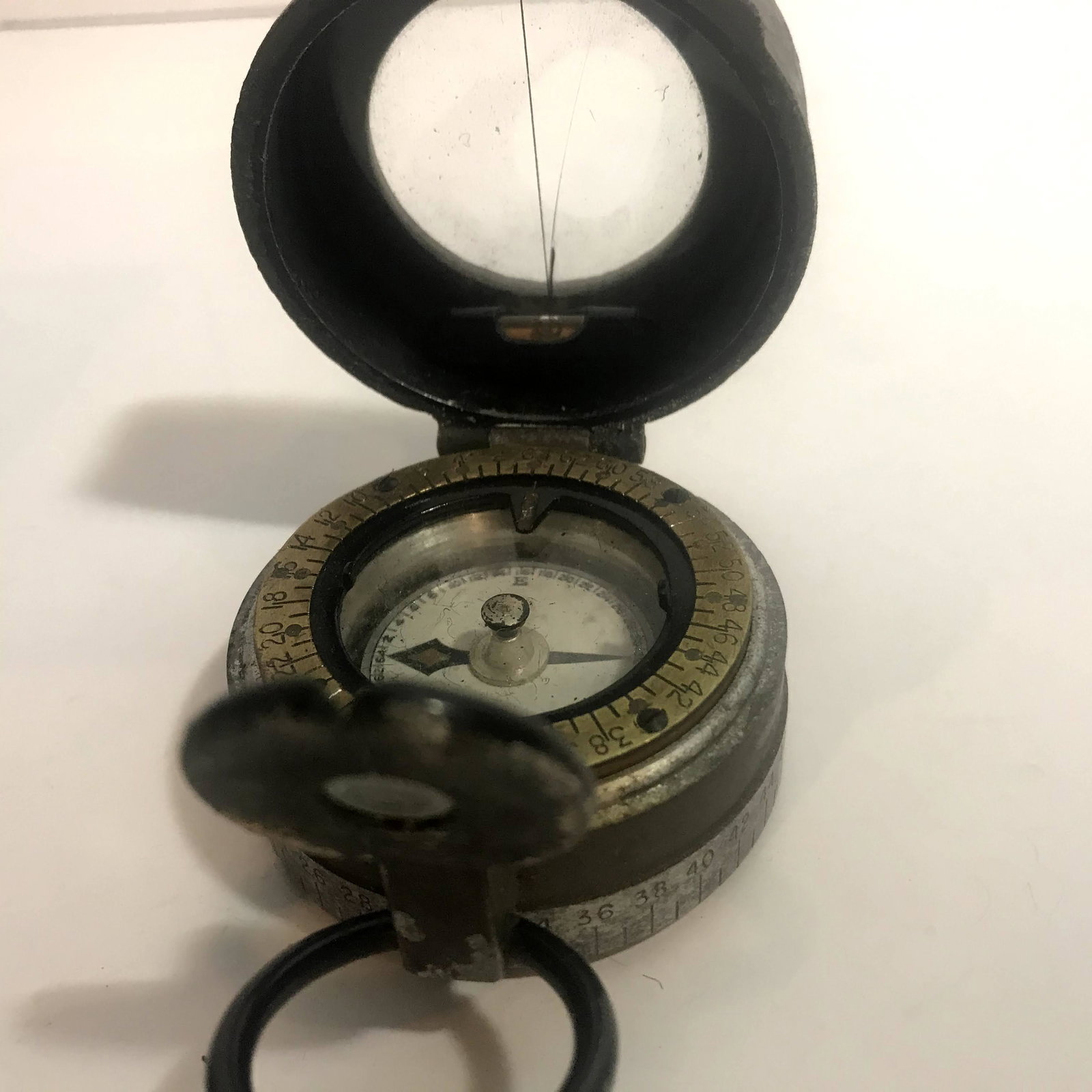 US WW2 M1938 Lensatic compass Paratrooper: US WW2 M1938 Lensatic compass (Paratrooper) With Case Please view all photos as they are part of the description and condition of this Item, Feel free to contact me with questions or picture requests!