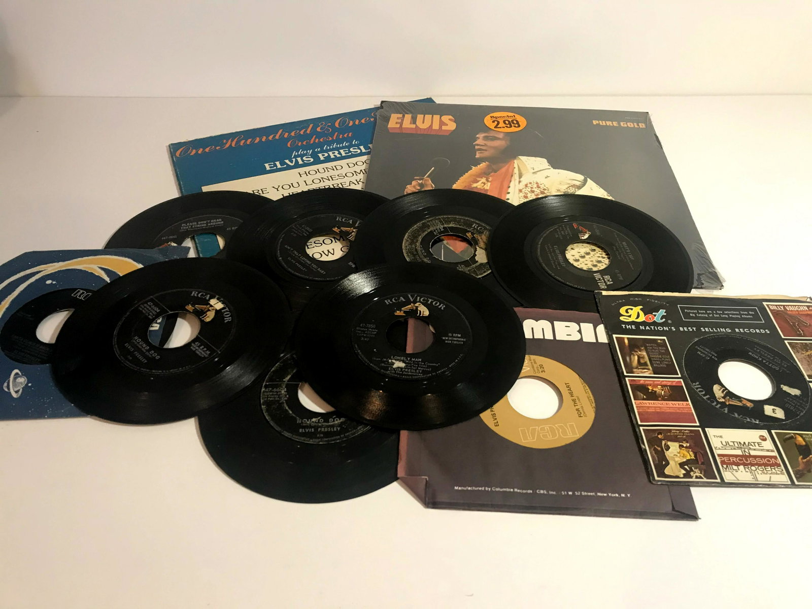 Elvis Presley Lot 2 lps one sealed 10 45s: Elvis Presley Lot 2 lps one sealed 10 45s Please view all photos as they are part of the description and condition of this Item, Feel free to contact me with questions or picture requests!. Used Item 