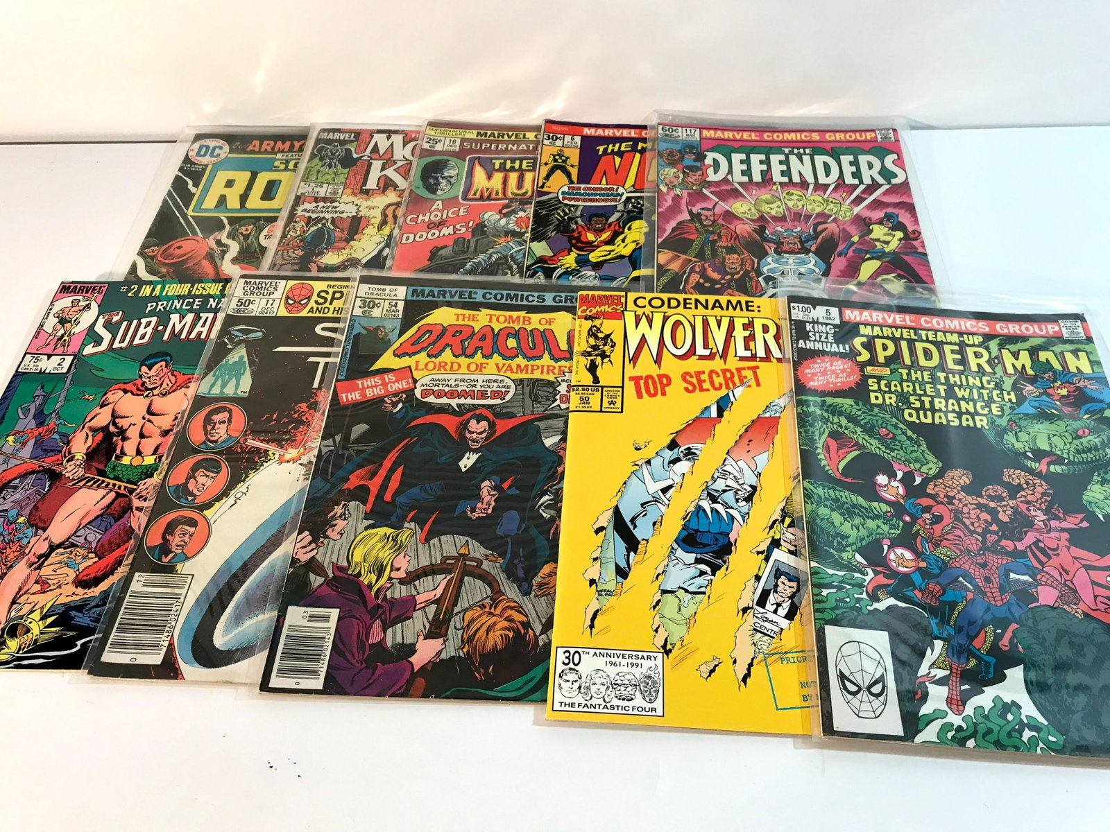 Nice Mixed Comic Lot of 10: marvel team-up # 5 wolverine # 50 tomb of dracula # 54 star trek # 17 sub-mariner # 2 the defenders # 117 man called nova # 6 the living mummy # 10 moon knight # 1 sgt rock # 279 Please view all photo