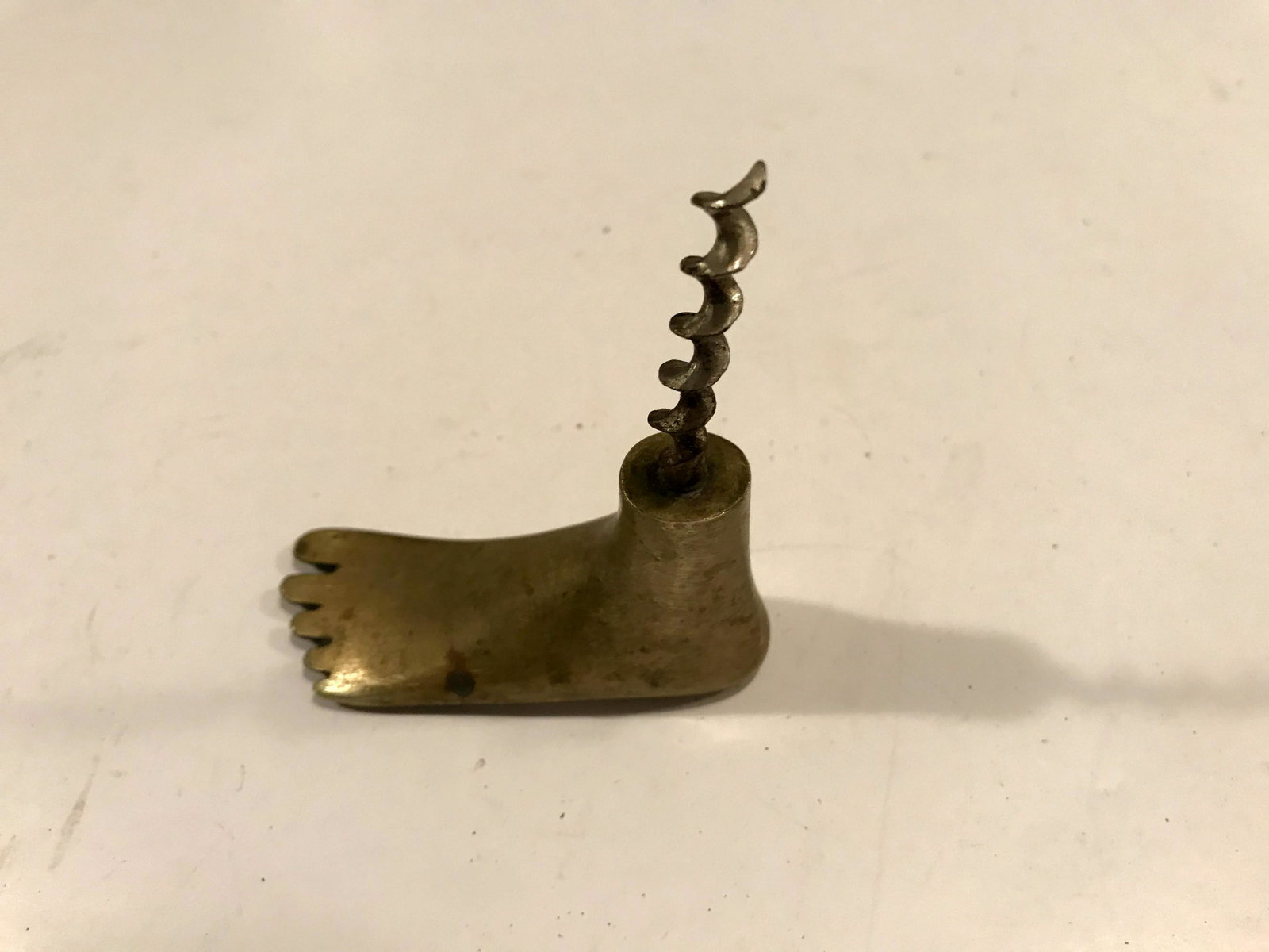 Old Aybuke Austrian Bronze Foot Corkscrew Brass: Old Aybuke Austrian Bronze Foot Corkscrew Figural Brass 3 1/2" Please view all photos as they are part of the description and condition of this Item, Feel free to contact me with questions or picture 