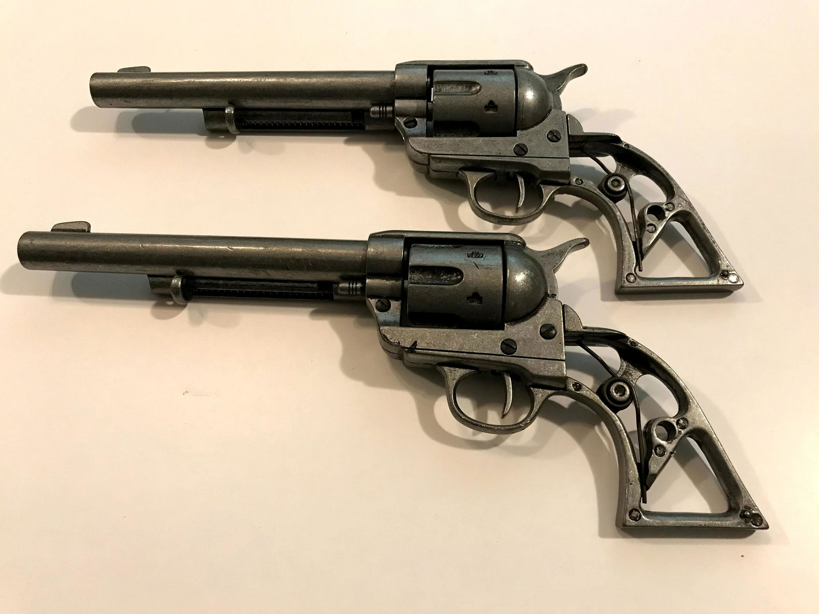 Two Vintage heavy Cast Iron Toy Guns: Two Vintage heavy Cast Iron Toy Guns Please view all photos as they are part of the description and condition of this Item, Feel free to contact me with questions or picture requests!. Used Item AS IS