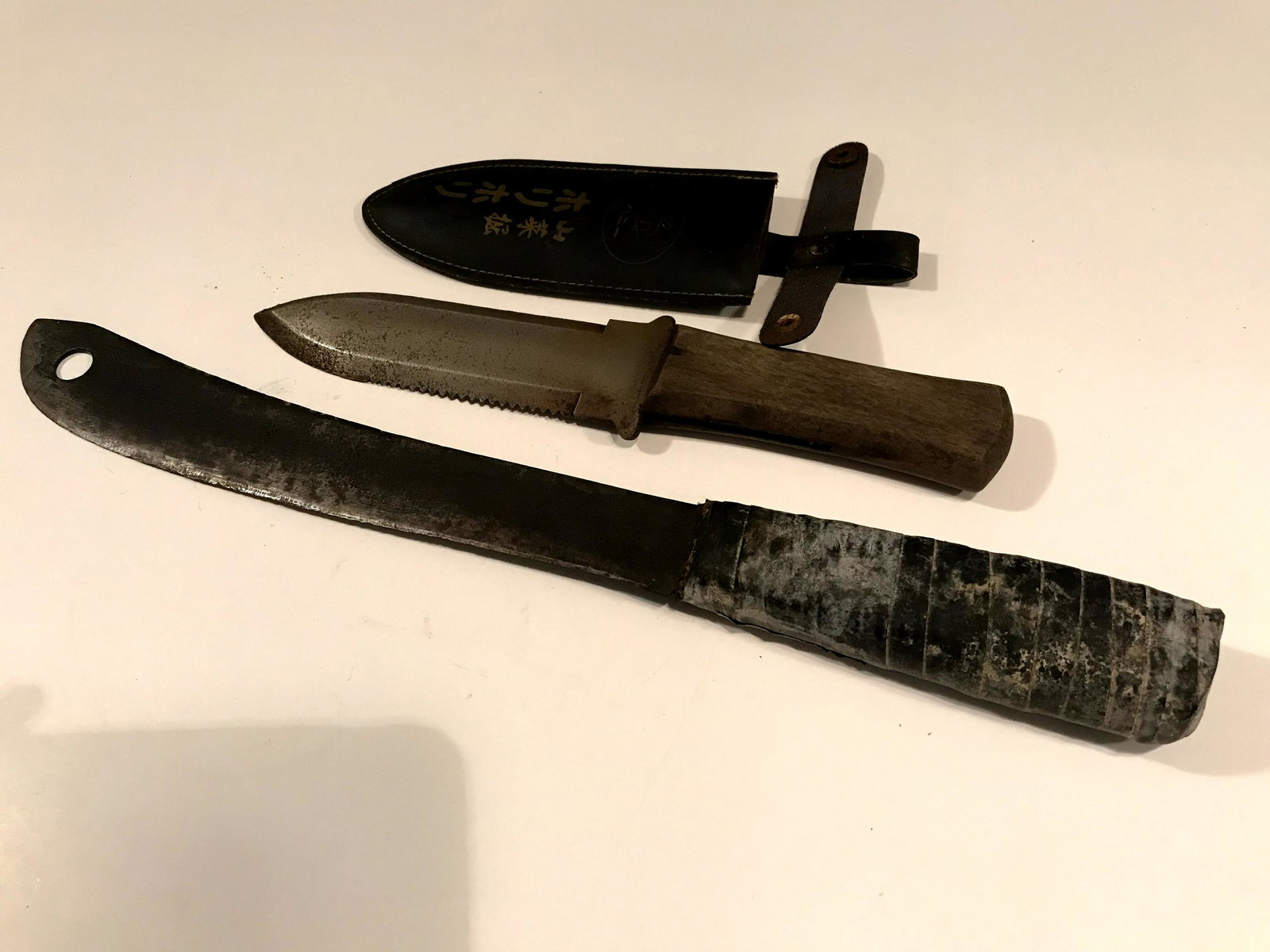Lot of 2 Vintage Knifes machete and Japan: Lot of 2 Vintage Knifes machete and Japan Possible Military Please view all photos as they are part of the description and condition of this Item, Feel free to contact me with questions or picture req