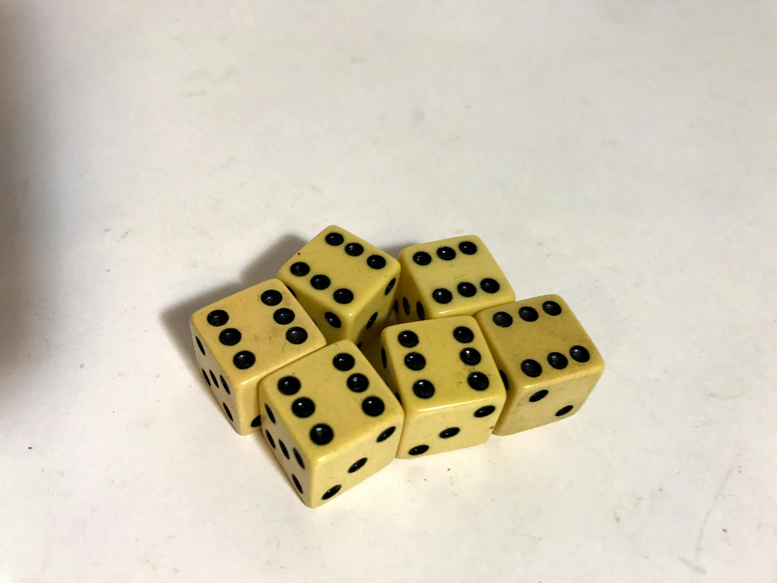 Lot of 6 Bakelite dice: Lot of 6 Bakelite dice Please view all photos as they are part of the description and condition of this Item, Feel free to contact me with questions or picture requests Used Item AS IS