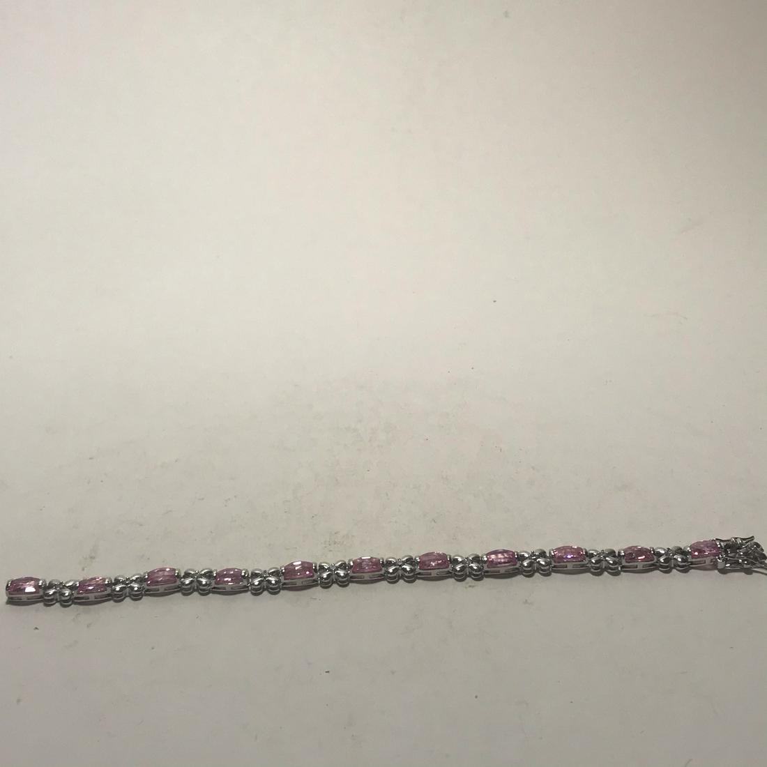 Vintage Sterling Silver Bracelet Pink Rhienstones: Vintage Sterling Silver Bracelet Pink Rhienstones Please view all photos as they are part of the description and condition of this Item, Feel free to contact me with questions or picture requests Used