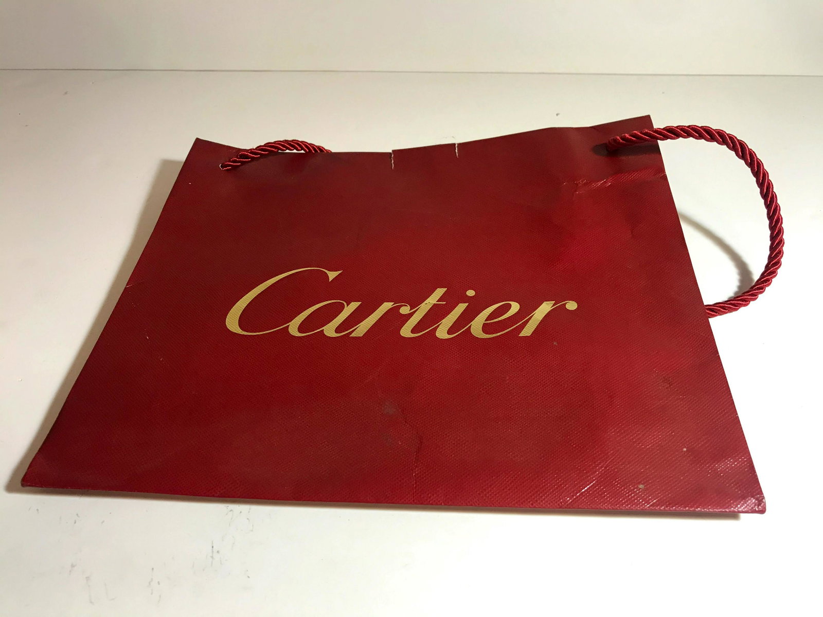 Vintage Cartier red bag: Vintage Cartier red bag Please view all photos as they are part of the description and condition of this Item, Feel free to contact me with questions or picture requests Used Item AS IS