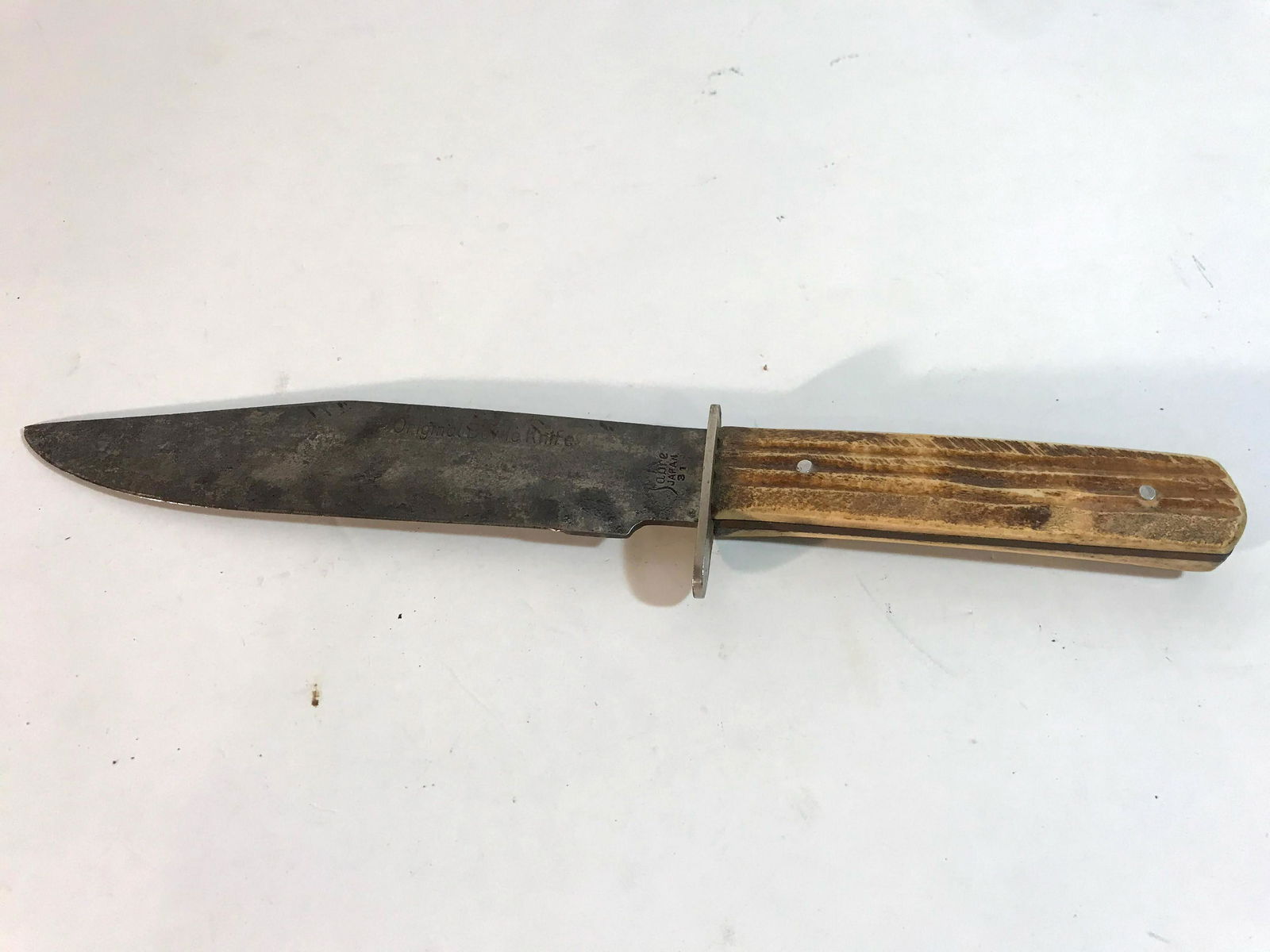 Sabre Japan Fixed Blade Knife #31: Sabre Japan Fixed Blade Knife #31 Please view all photos as they are part of the description and condition of this Item, Feel free to contact me with questions or picture requests Used Item AS IS