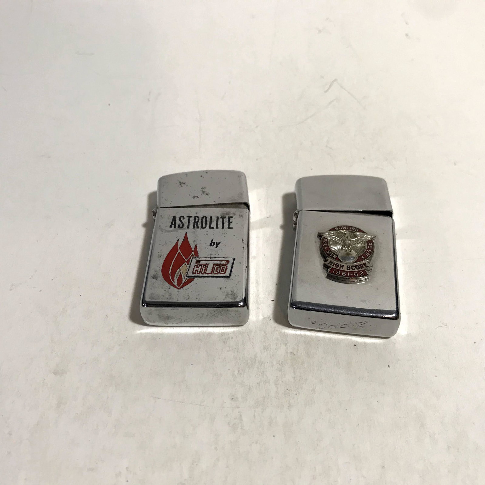 Two Vintage Small Zippo Lighters: Two Vintage Small Zippo Lighters Please view all photos as they are part of the description and condition of this Item, Feel free to contact me with questions or picture requests Used Item AS IS