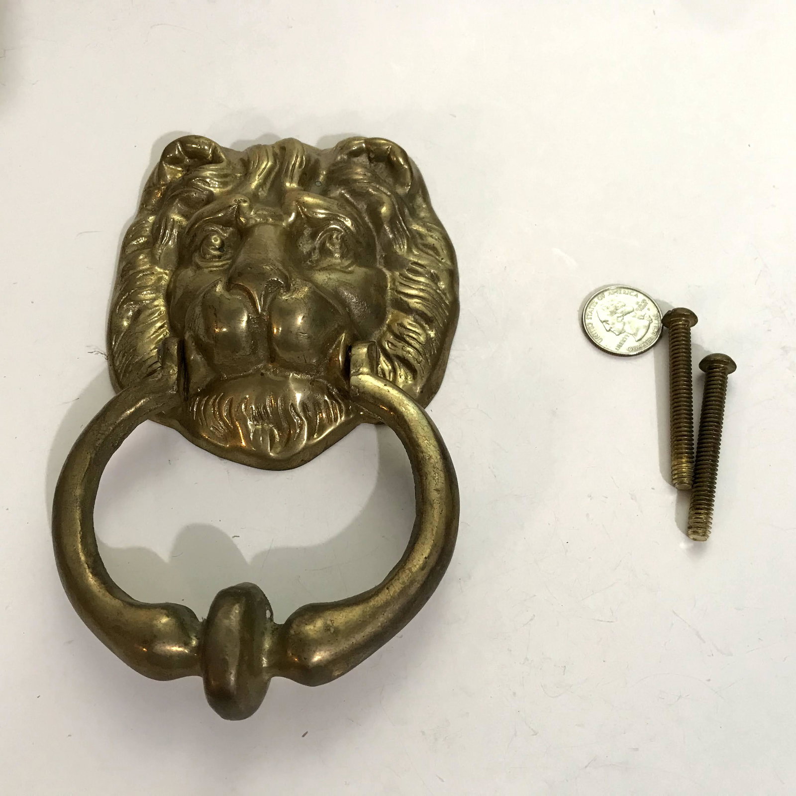 Vintage Solid Brass Lion head door knocker: Vintage Solid Brass Lion head door knocker Please view all photos as they are part of the description and condition of this Item, Feel free to contact me with questions or picture requests Used Item A