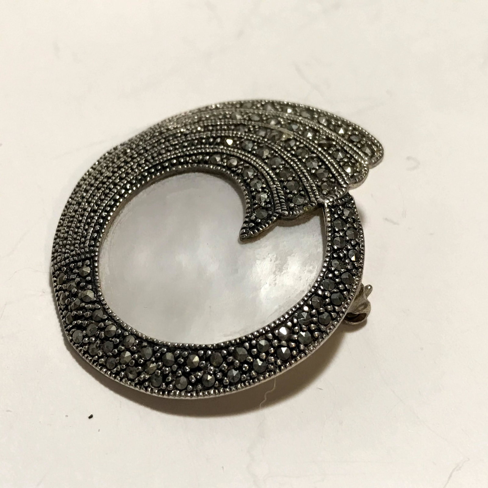925 Sterling Vintage Marcasite Gem Swirl Large Brooch: 925 Sterling Vintage Marcasite Gem Swirl Large Brooch / Pendant Mother of pearl Please view all photos as they are part of the description and condition of this Item, Feel free to contact me with ques