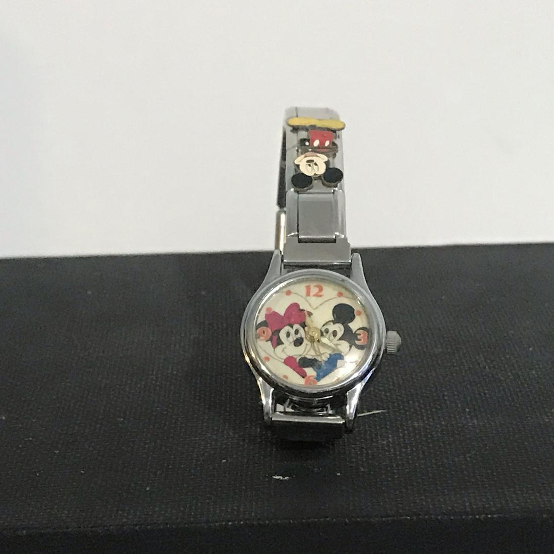 Vintage Mickey Mouse And Mini Mouse Watch: Vintage Mickey Mouse And Mini Mouse Watch not sure if working Please view all photos as they are part of the description and condition of this Item, Feel free to contact me with questions or picture r