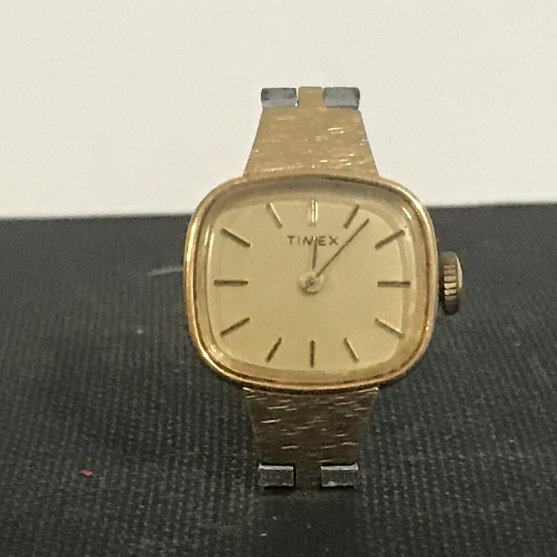 Vintage Timex Ladies Gold Plated Mechanical Hand Wind: Vintage Timex Ladies Gold Plated Mechanical Hand Wind Watch Working Please view all photos as they are part of the description and condition of this Item, Feel free to contact me with questions or pic