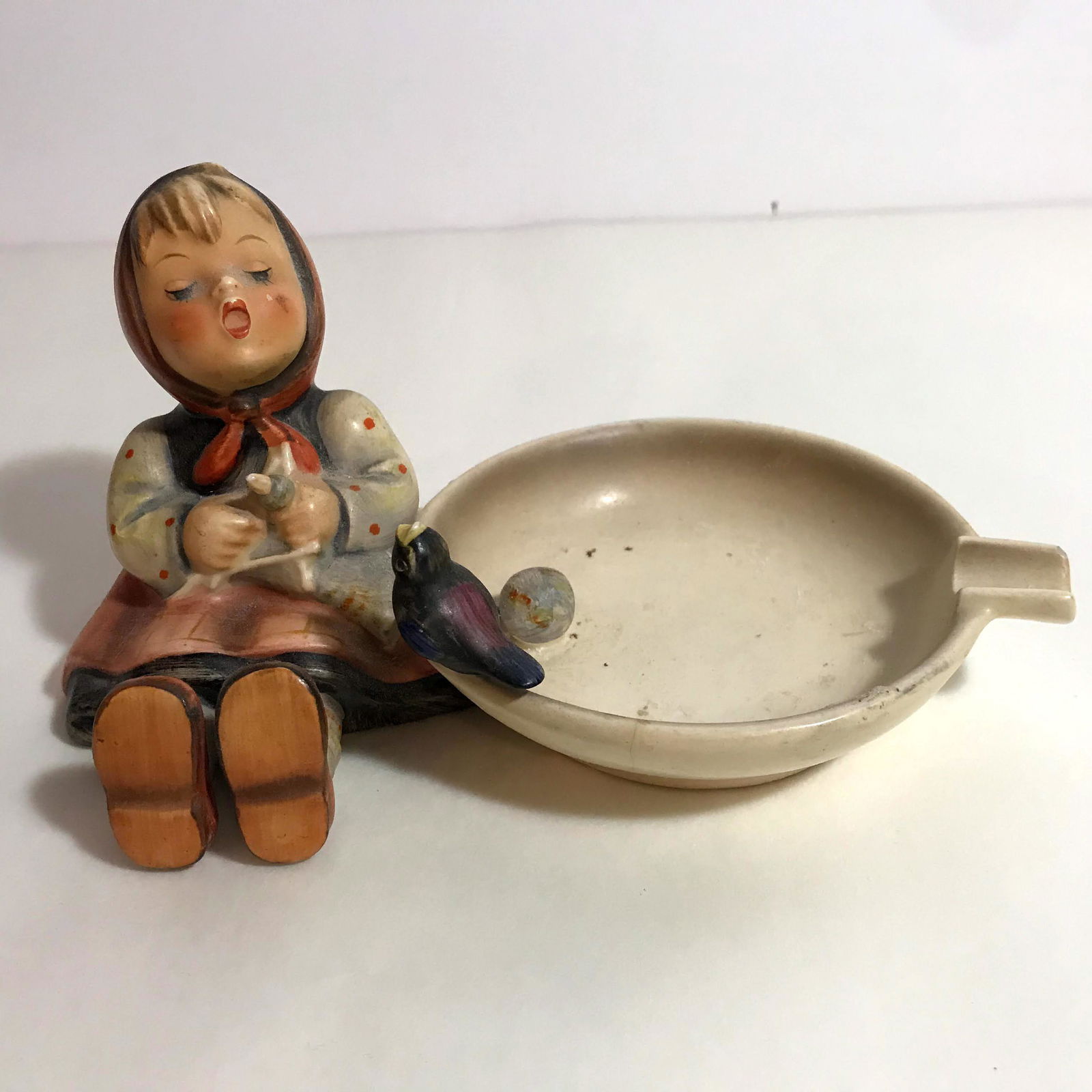 Goebel Hummel # 62 Happy Past Time Ashtray: Goebel Hummel # 62 Happy Past Time Ashtray Please view all photos as they are part of the description and condition of this Item, Feel free to contact me with questions or picture requests Used Item A