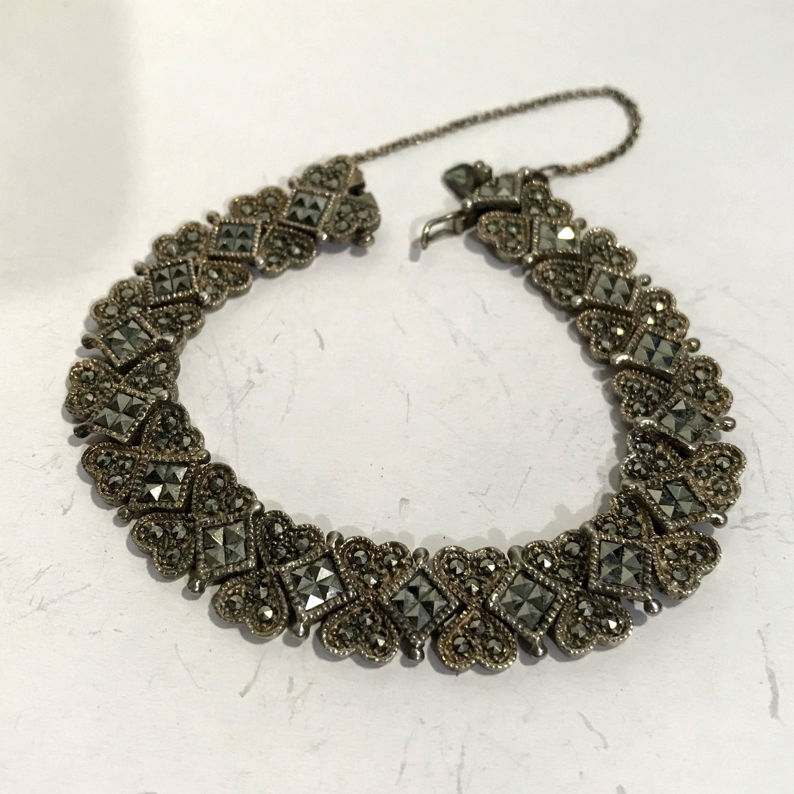 Sterling Silver Marcasite Heart Shaped Bracelet 7 1/2": Sterling Silver Marcasite Heart Shaped Bracelet 7 1/2" Please view all photos as they are part of the description and condition of this Item, Feel free to contact me with questions or picture requests