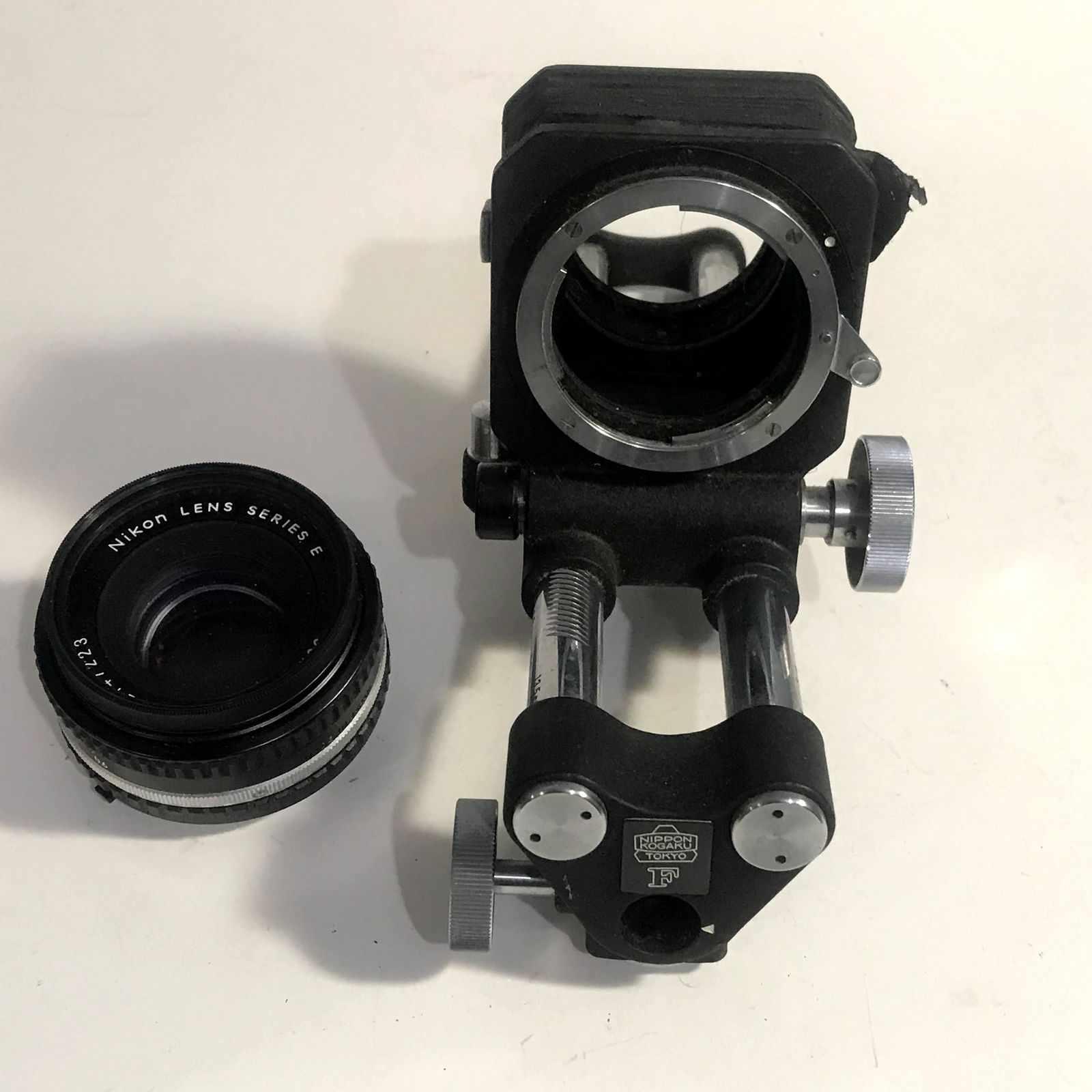 Vintage Nikon Lens Series E 50mm 1:1.8 Lens & nipon f: Vintage Nikon Lens Series E 50mm 1:1.8 Lens & nipon f bellows the bellows are detached Please view all photos as they are part of the description and condition of this Item, Feel free to contact me wi