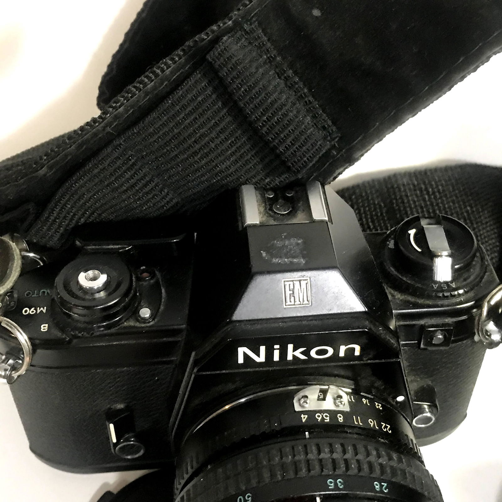 Nikon EM 35mm SLR Camera w/flash, lenses, filter, bag,: Nikon EM 35mm SLR Camera w/flash, lenses, filter, bag, case Please view all photos as they are part of the description and condition of this Item, Feel free to contact me with questions or picture req