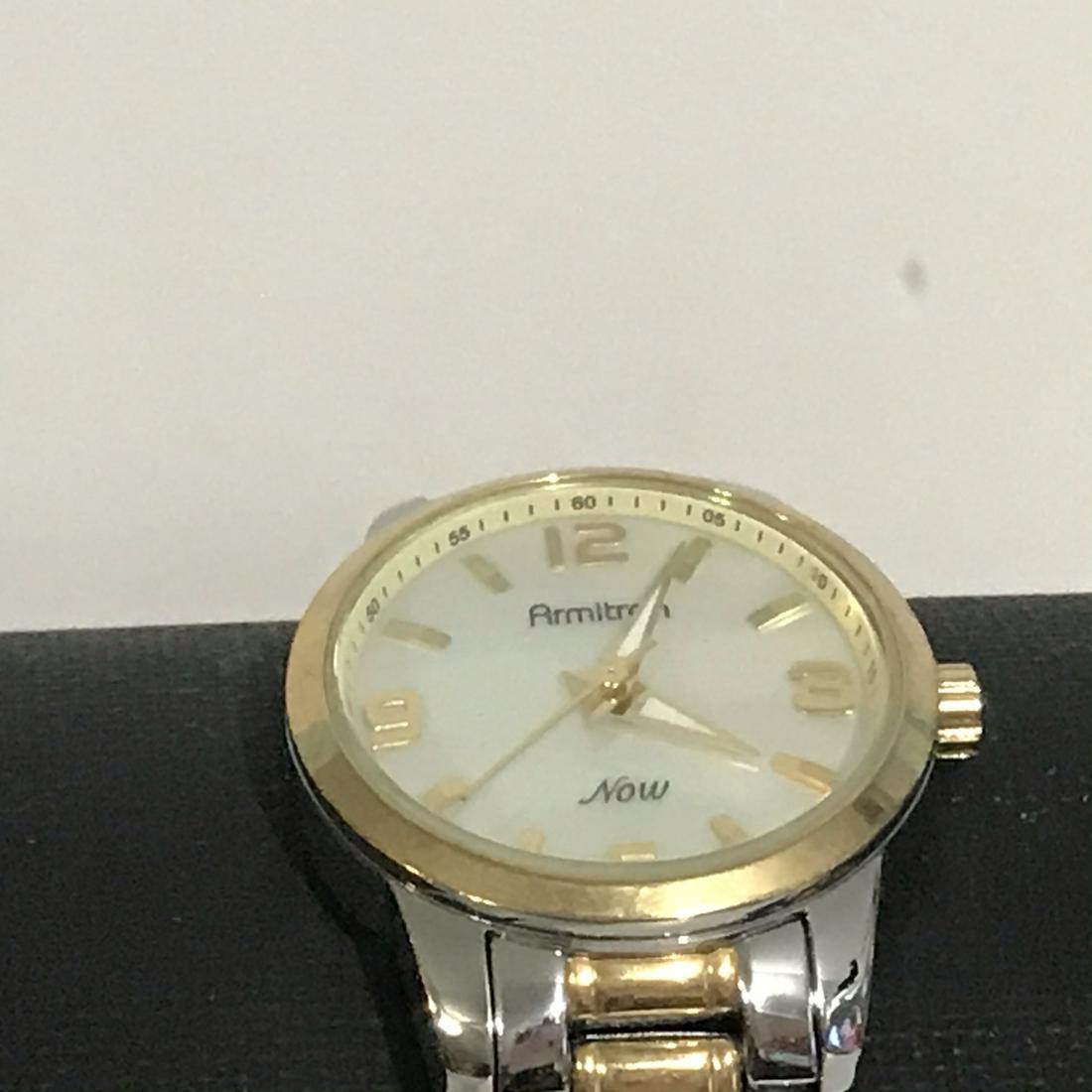 Women's Two Tone Armitron Now Watch, Link Bracelet Band: Women's Two Tone Armitron Now Watch, Link Bracelet Band Works Please view all photos as they are part of the description and condition of this Item, Feel free to contact me with questions or picture r