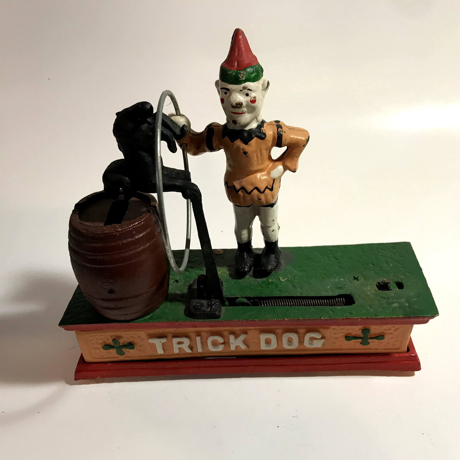 Cast Iron Trick Dog Circus Clown Mechanical Bank: Cast Iron Trick Dog Circus Clown Mechanical Bank Please view all photos as they are part of the description and condition of this Item, Feel free to contact me with questions or picture requests Used 