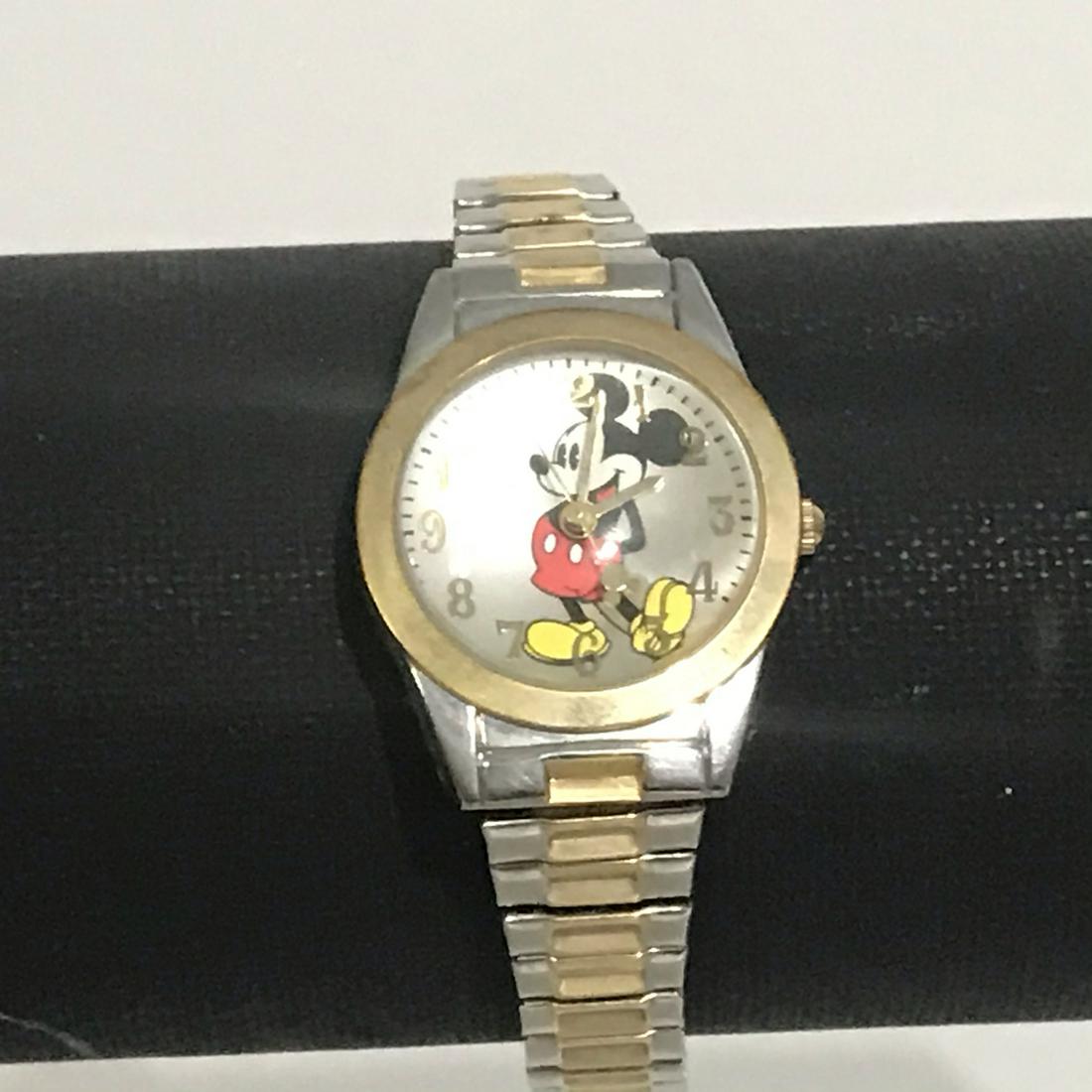 Disney Mickey Mouse Women's Two Tone Expansion Band: Disney Mickey Mouse Women's Two Tone Expansion Band Watch Model MCK579 Working Please view all photos as they are part of the description and condition of this Item, Feel free to contact me with quest