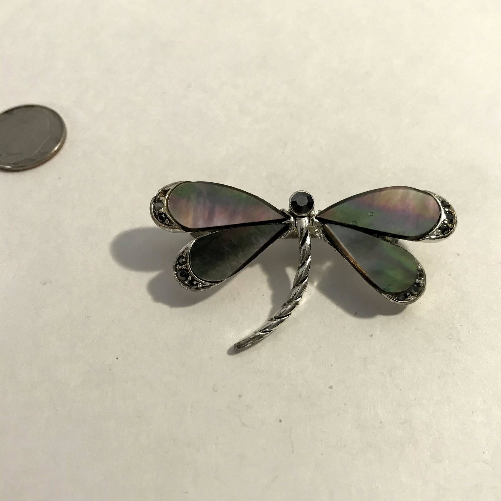 Vintage Monet Mother of Pearl Black Rhinestones: Vintage Monet Mother of Pearl Black Rhinestones Accented Dragonfly Brooch Please view all photos as they are part of the description and condition of this Item, Feel free to contact me with questions 