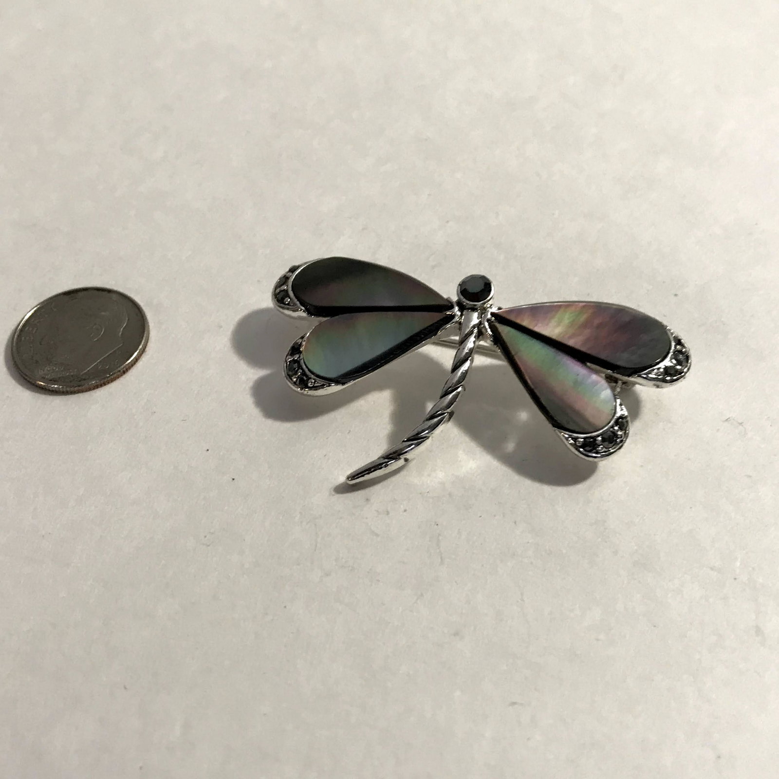 Vintage Monet Mother of Pearl Black Rhinestones: Vintage Monet Mother of Pearl Black Rhinestones Accented Dragonfly Brooch Please view all photos as they are part of the description and condition of this Item, Feel free to contact me with questions 