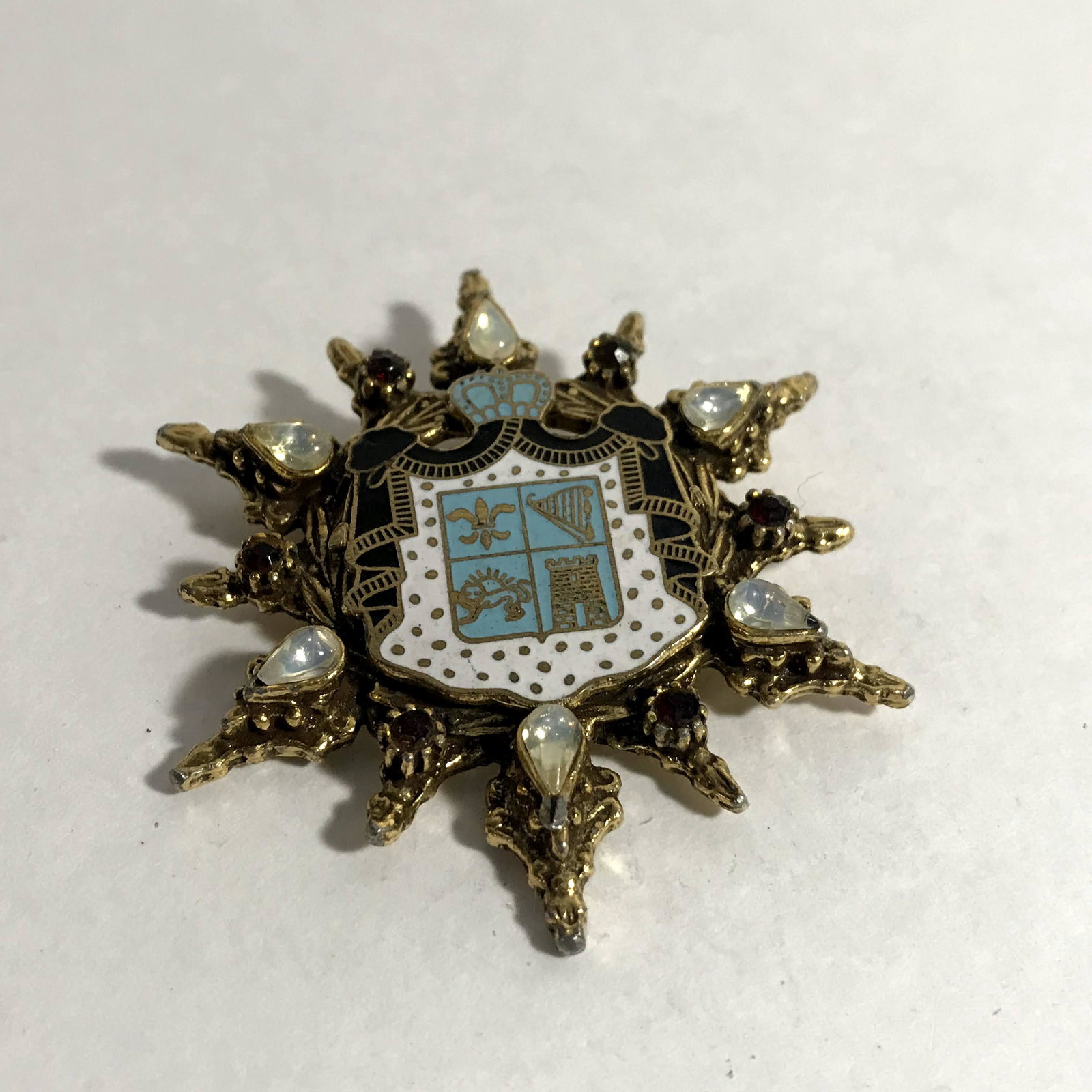 Antique/Vintage Brass/Enamel Coat of Arms Shield Brooch: Antique/Vintage Brass/Enamel Coat of Arms Shield Brooch Fleur di les, Harp, Lion Please view all photos as they are part of the description and condition of this Item, Feel free to contact me with que