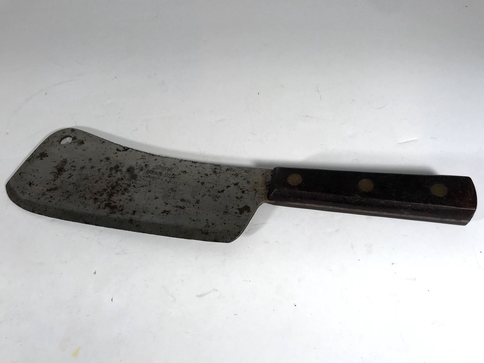 Vintage Supreme Cleaver Butcher Knife 7" Blade 12": Vintage Supreme Cleaver Butcher Knife 7" Blade 12" Overall Carbon Steel Please view all photos as they are part of the description and condition of this Item, Feel free to contact me with questions or