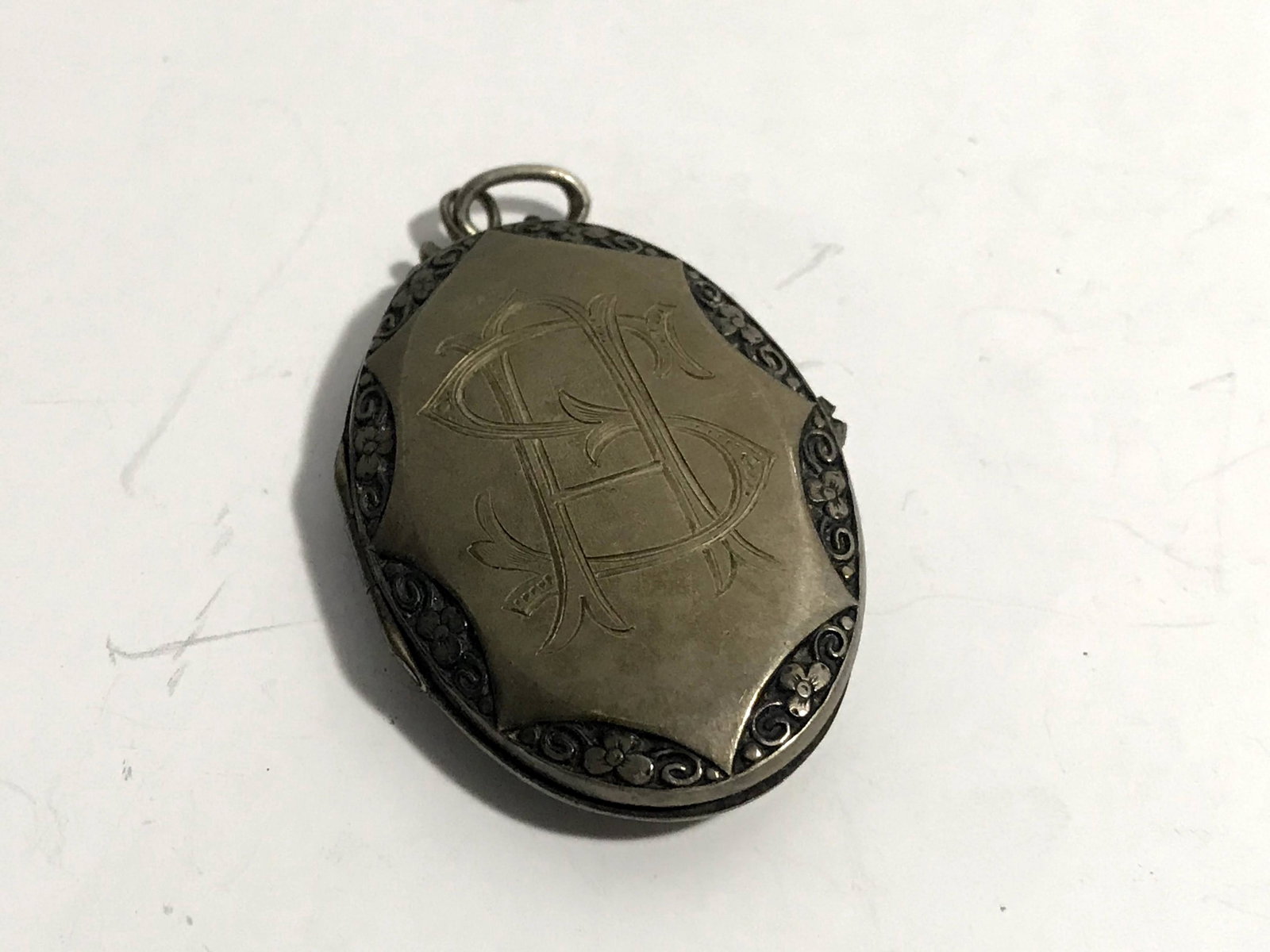 Large 2Ã¢Â€ Vintage Silver Hinged Photo Locket Engraved: Large 2” Vintage Silver Hinged Photo Locket Engraved Please view all photos as they are part of the description and condition of this Item, Feel free to contact me with questions or picture requ