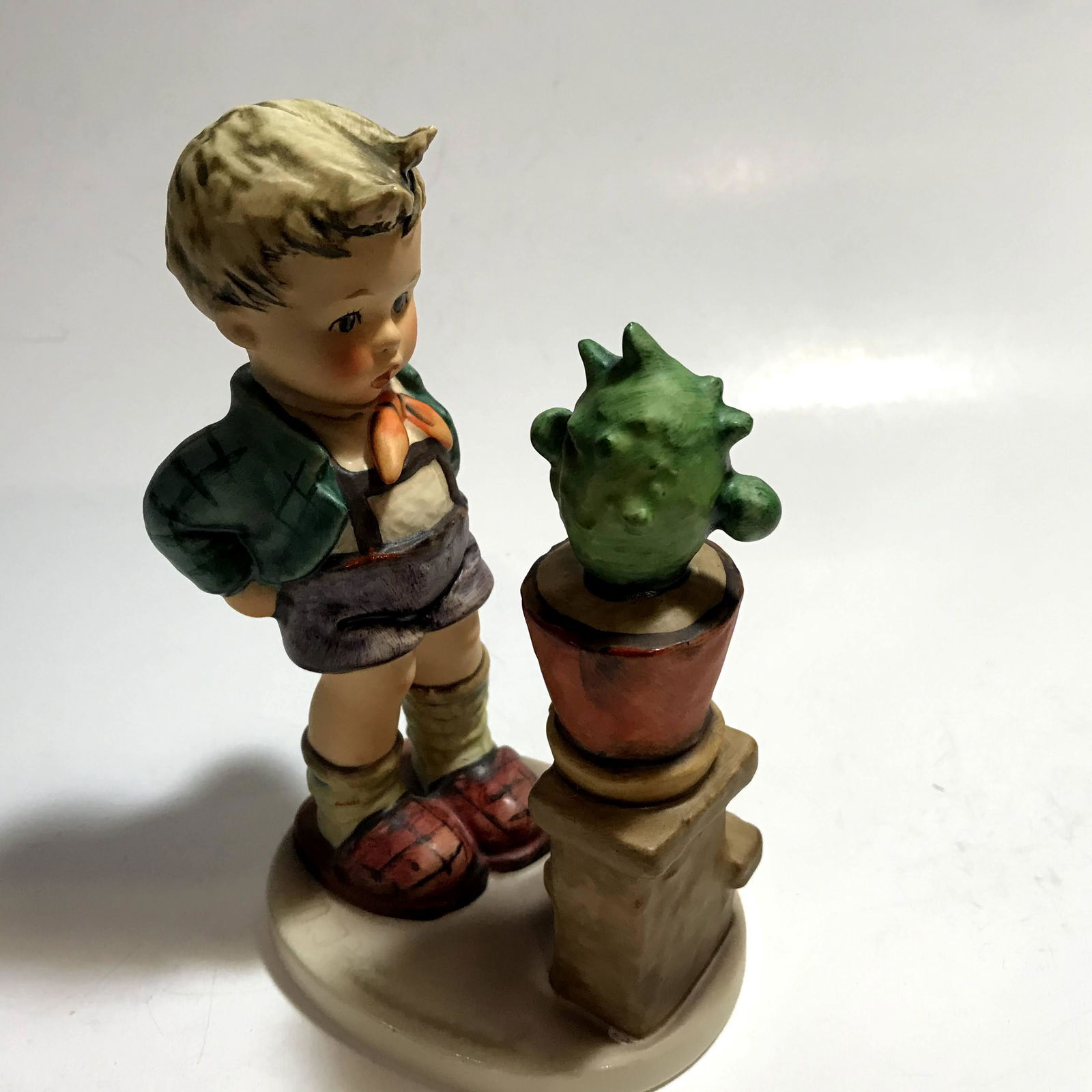 Vintage M.I. Hummel by Goebel "Confidentially" 314 1972: Vintage M.I. Hummel by Goebel "Confidentially" 314 1972 Boy & Cactus Please view all photos as they are part of the description and condition of this Item, Feel free to contact me with questions or pi