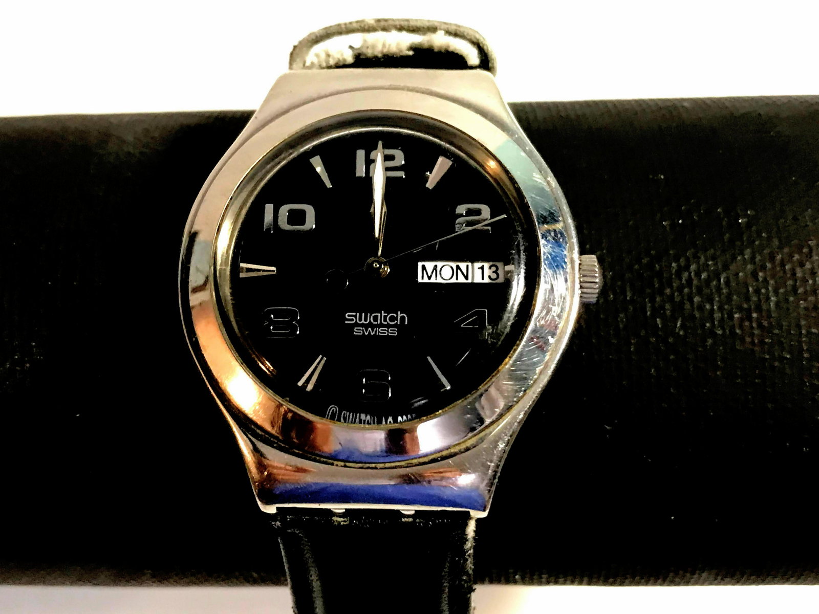 swatch irony watch 2005 on dial black and silver color: swatch irony watch 2005 on dial black and silver color day date works great worn band Please view all photos as they are part of the description and condition of this Item, Feel free to contact me wit