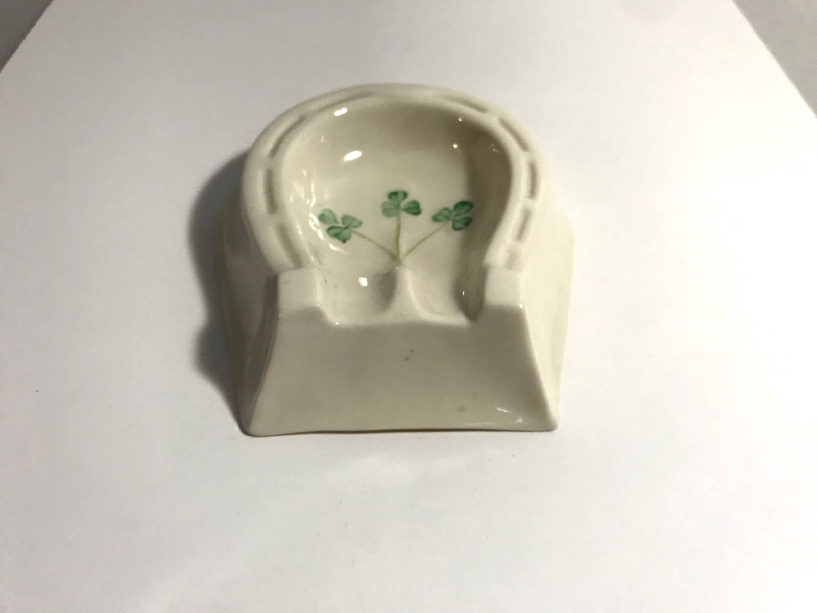 Vintage Belleek Irish Ashtray Green Shamrocks Horseshoe: Vintage Belleek Irish Ashtray Green Shamrocks Horseshoe shaped Please view all photos as they are part of the description and condition of this Item, Feel free to contact me with questions or picture 