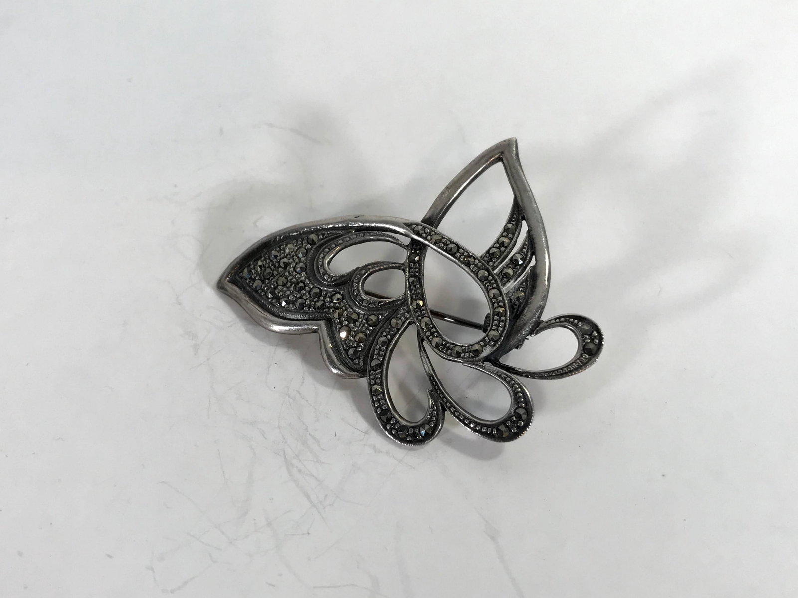 Vintage Sterling Silver Marcasite Cut Out Butterfly: Vintage Sterling Silver Marcasite Cut Out Butterfly Brooch Pin Please view all photos as they are part of the description and condition of this Item, Feel free to contact me with questions or picture 