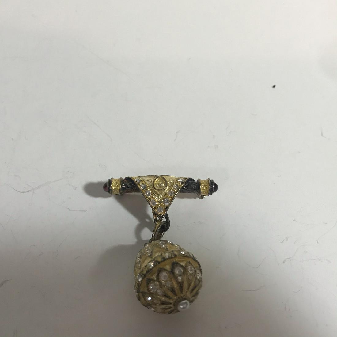 Sterling Silver 925 Brooch Faberge Egg Hook Gold Enamel: Sterling Silver 925 Brooch Faberge Egg Hook Gold Enamel & Rhinestones Please view all photos as they are part of the description and condition of this Item, Feel free to contact me with questions or p