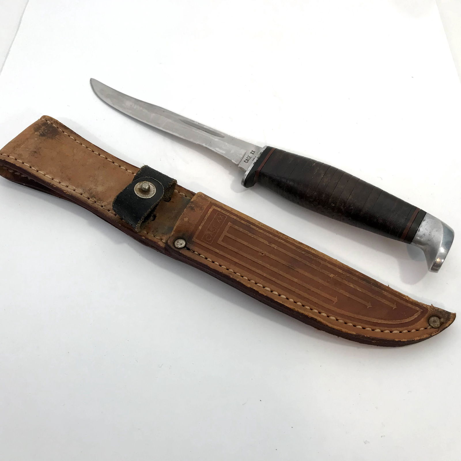 Vintage " Case XX " #316-5 Bowie Style Hunting Knife: Vintage " Case XX " #316-5 Bowie Style Hunting Knife with Sheath 9 1/2" blade 5" knife has been sharpened down Please view all photos as they are part of the description and condition of this Item, Fe