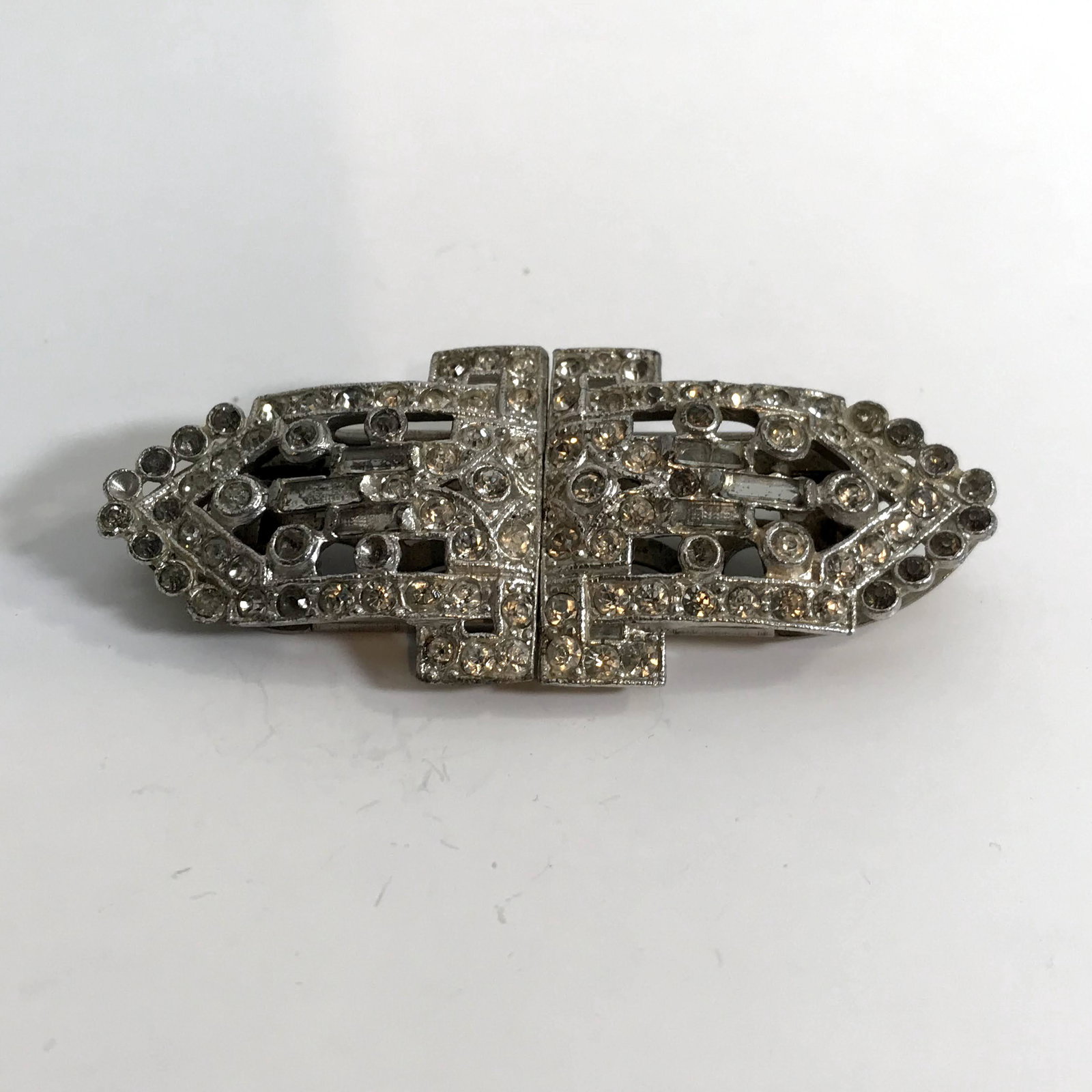 Vintage Art Deco plated Duette Rhinestone Brooch Pin: Vintage Art Deco plated Duette Rhinestone Brooch Pin Fur Dress Clip missing some stones Please view all photos as they are part of the description and condition of this Item, Feel free to contact me w