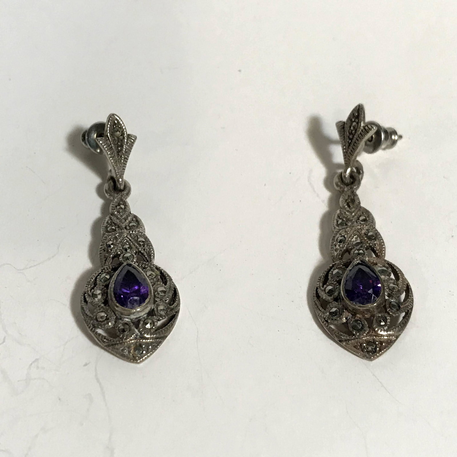 Vintage Pair of Sterling Silver .925 Amethyst Marcasite: Vintage Pair of Sterling Silver .925 Amethyst Earrings Nice!!! Please view all photos as they are part of the description and condition of this Item, Feel free to contact me with questions or picture 