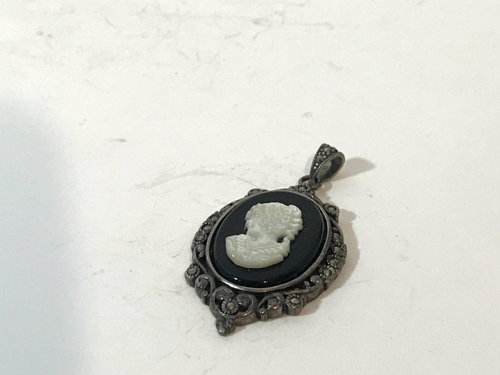 Vintage Sterling Silver 925 MOP Marcasite Black Onyx: Vintage Sterling Silver 925 MOP Marcasite Black Onyx Cameo pendant 2" Please view all photos as they are part of the description and condition of this Item, Feel free to contact me with questions or p