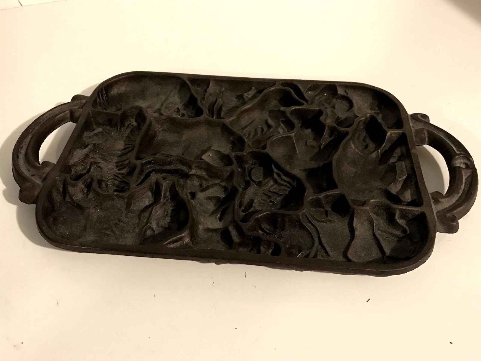 John Wright Vintage 1984 Cast Iron Wild Animal Puzzle: John Wright Vintage 1984 Cast Iron Wild Animal Puzzle Candy Mold Baking Pan Please view all photos as they are part of the description and condition of this Item, Feel free to contact me with question