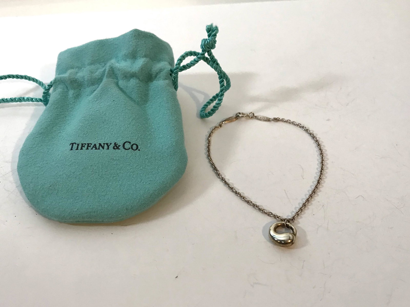 Tiffany & Co. Elsa Peretti Sterling Silver 7 1/4": Tiffany & Co. Elsa Peretti Sterling Silver 7 1/4" Eternal Circle Charm Bracelet Please view all photos as they are part of the description and condition of this Item, Feel free to contact me with ques