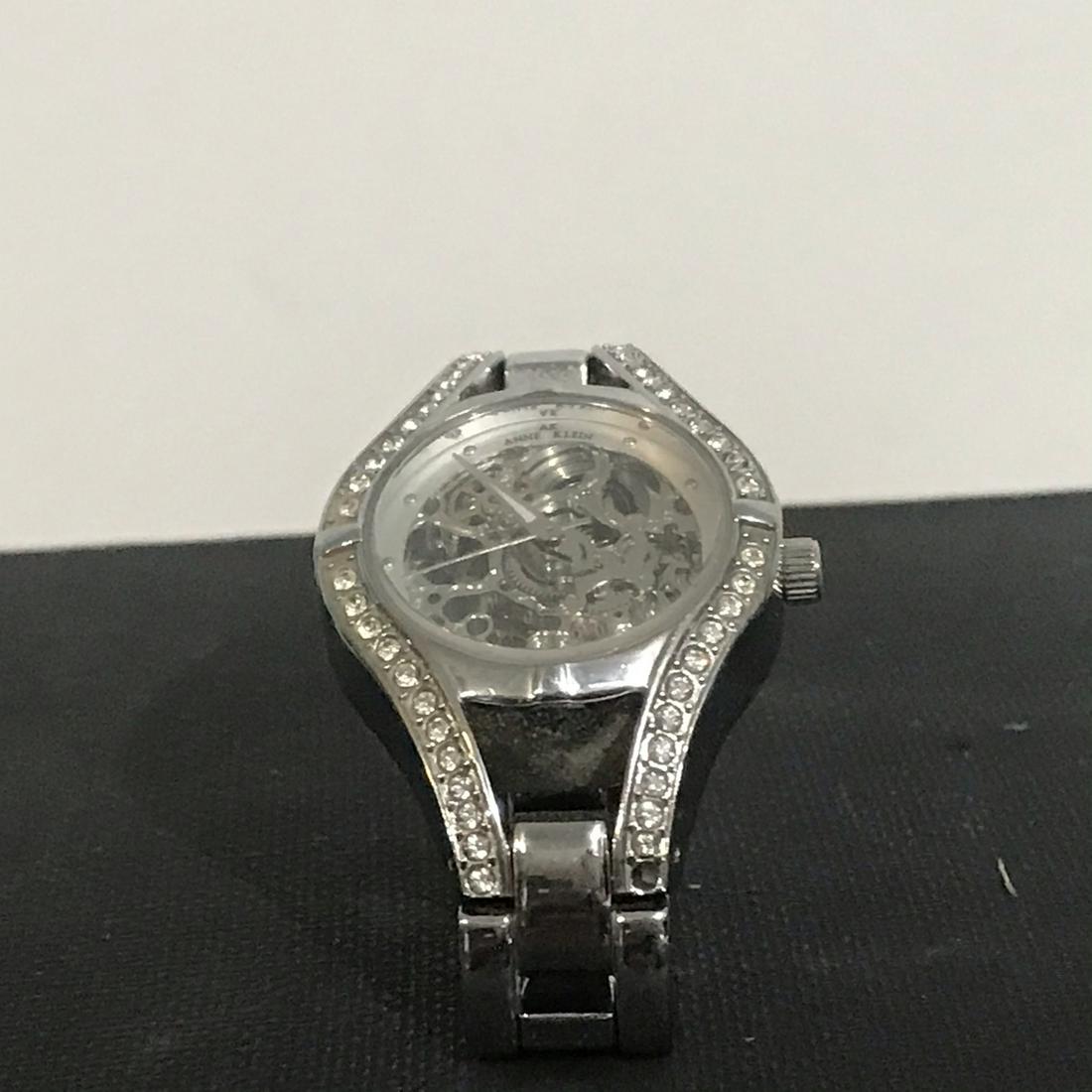 Anne Klein Womans Watch Silver Tone Works: Anne Klein Womans Watch Silver Tone Works Please view all photos as they are part of the description and condition of this Item, Feel free to contact me with questions or picture requests Used Item AS