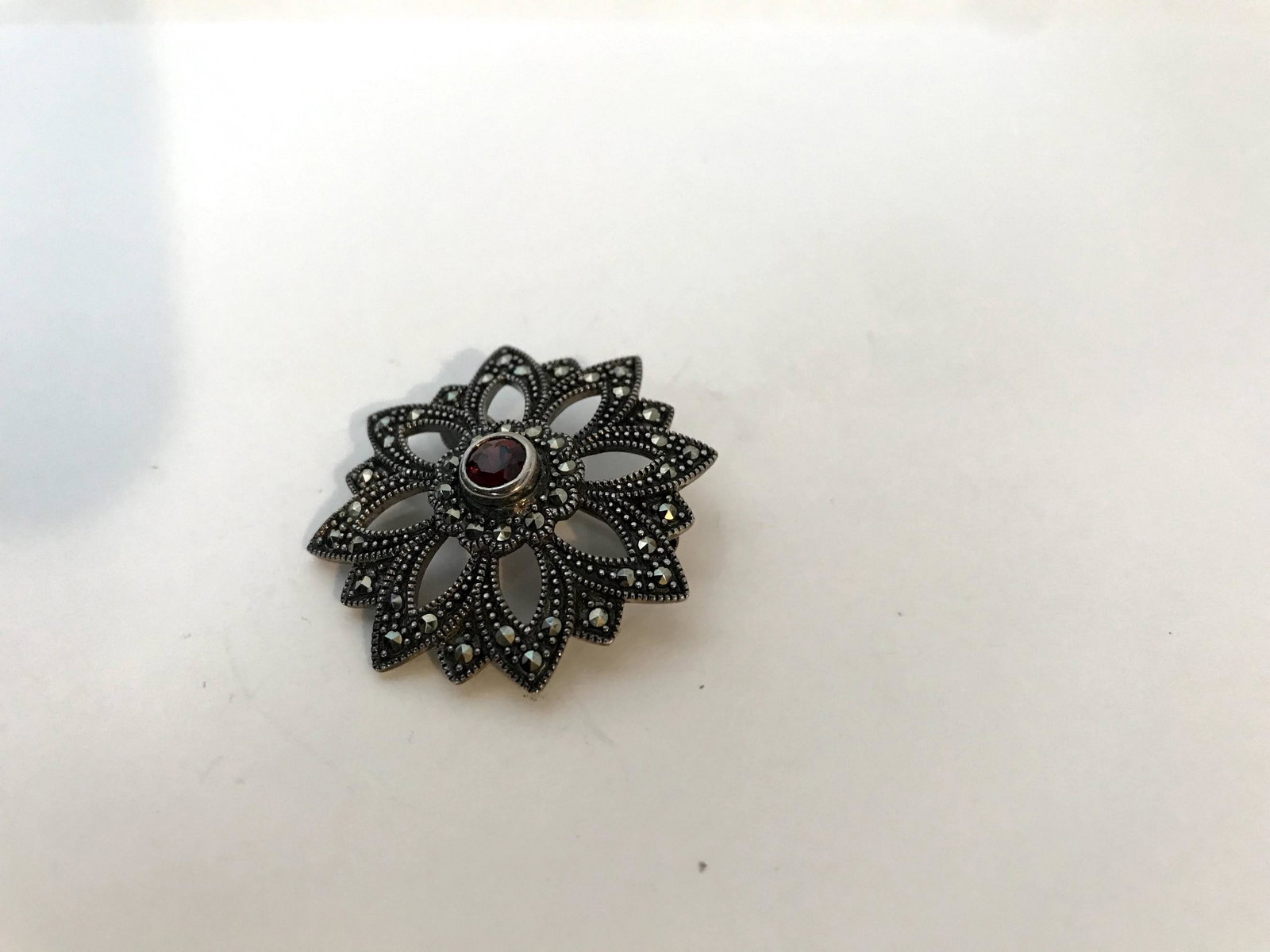 926 Sterling Silver - Vintage Amethyst Marcasite Brooch: 926 Sterling Silver - Vintage Amethyst Marcasite Brooch Please view all photos as they are part of the description and condition of this Item, Feel free to contact me with questions or picture request