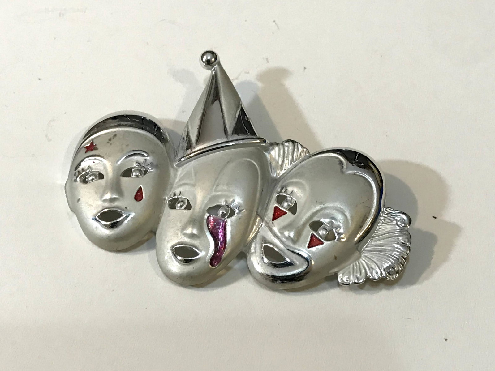 Jester Clowns Brooch Pin 3 Face Mask Silver Tone 3 1/2": Jester Clowns Brooch Pin 3 Face Mask Silver Tone 3 1/2" Please view all photos as they are part of the description and condition of this Item, Feel free to contact me with questions or picture request