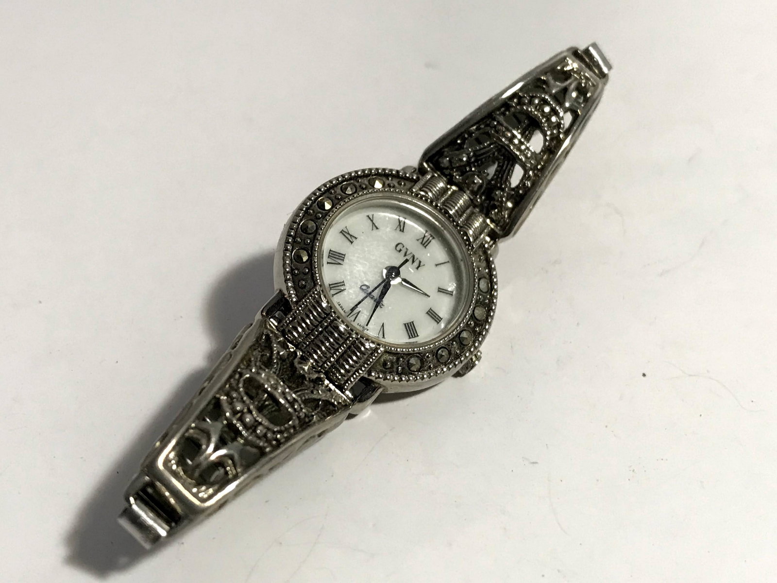 Vintage Lovely Silver Tone GVNY K-406 Ladies marcasite: Vintage Lovely Silver Tone GVNY K-406 Ladies marcasite quartz watch Stainless Steel Please view all photos as they are part of the description and condition of this Item, Feel free to contact me with 