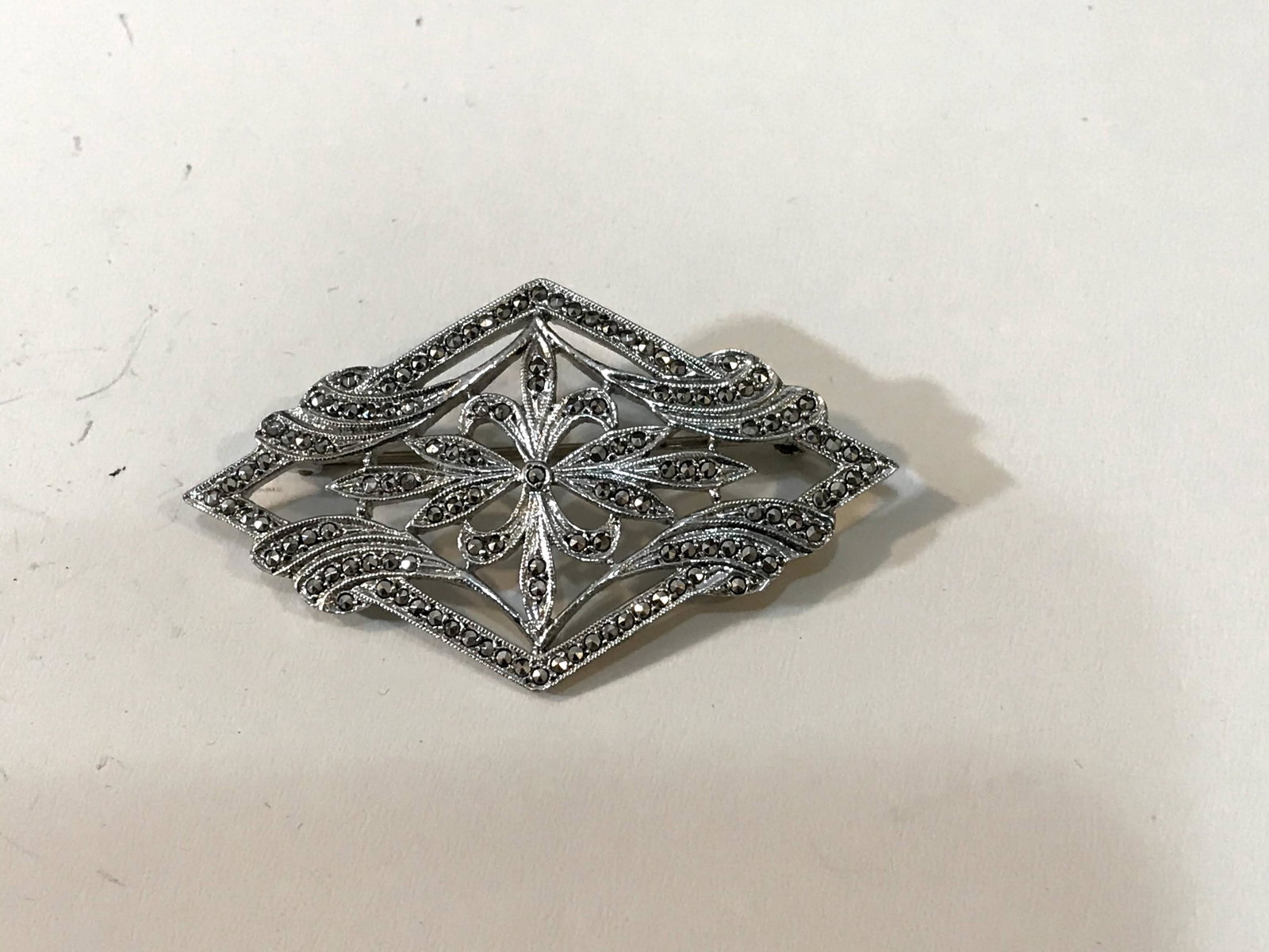 Vintage Sterling Silver & Marcasite Brooch 2 1/8": Vintage Sterling Silver & Marcasite Brooch 2 1/8" Please view all photos as they are part of the description and condition of this Item, Feel free to contact me with questions or picture requests!. Us