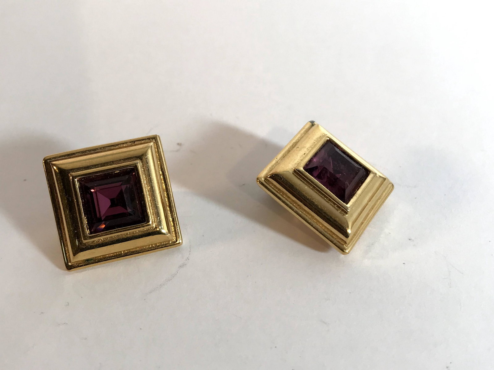 Vintage Monet Gold tone Amethyst Earrings: Vintage Monet Gold tone Amethyst Earrings Please view all photos as they are part of the description and condition of this Item, Feel free to contact me with questions or picture requests! Used Item A