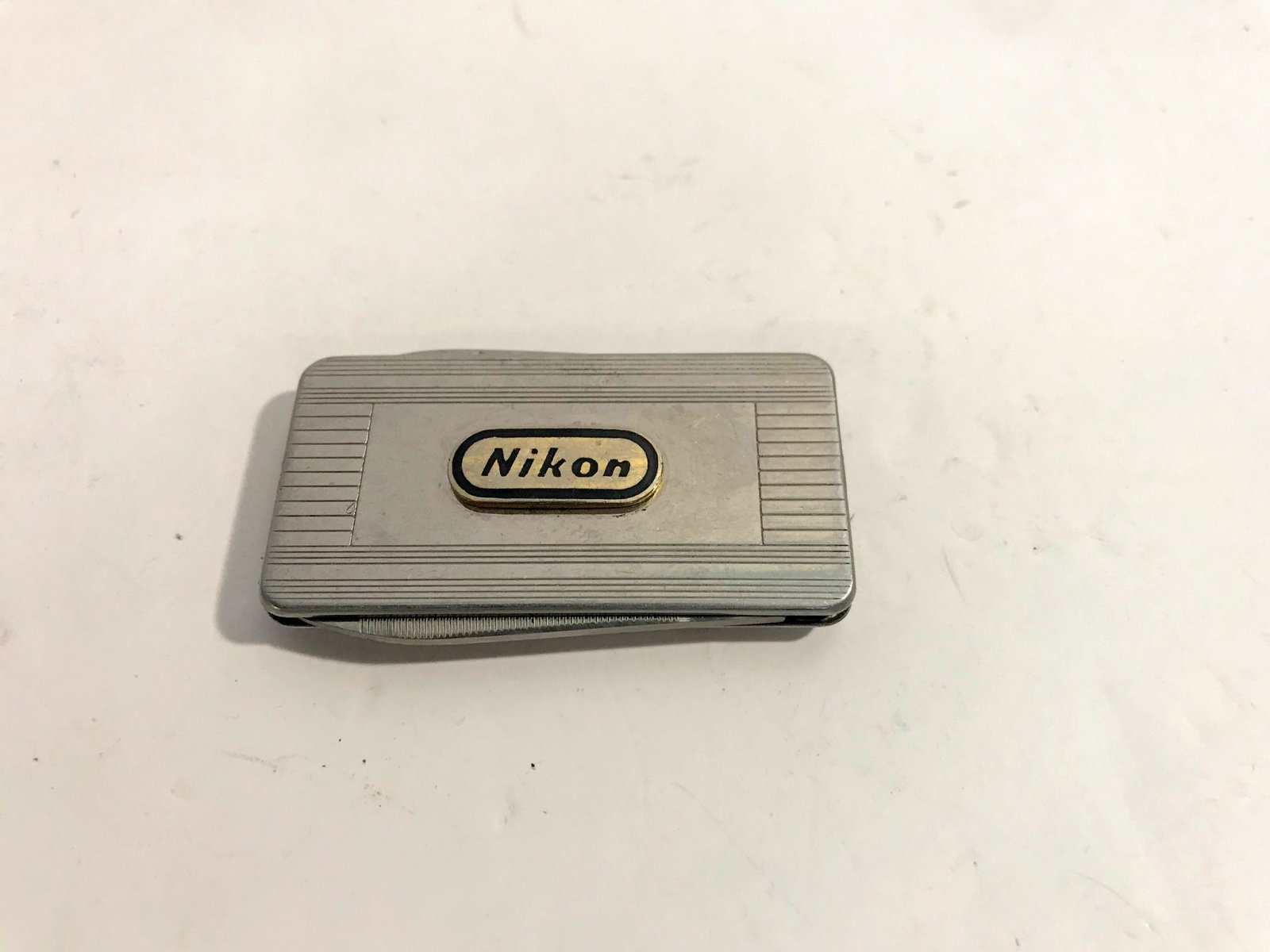 Vintage Nikon Folding Pocket Knife: Vintage Nikon Folding Pocket Knife Please view all photos as they are part of the description and condition of this Item, Feel free to contact me with questions or picture requests!. Used Item AS IS