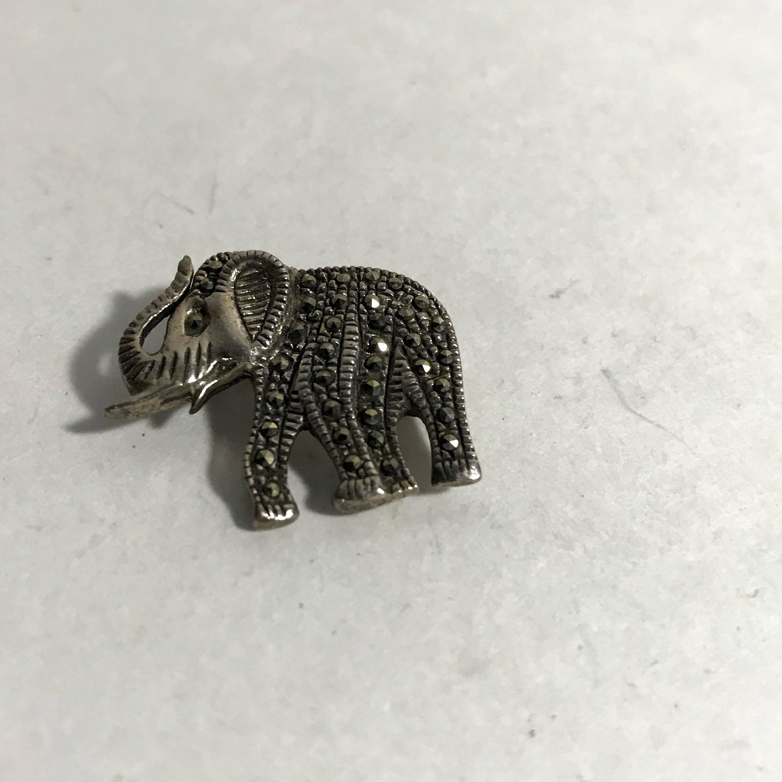 vintage sterling silver marcasite elephant brooch 1": vintage sterling silver marcasite elephant brooch 1" Please view all photos as they are part of the description and condition of this Item, Feel free to contact me with questions or picture requests! 
