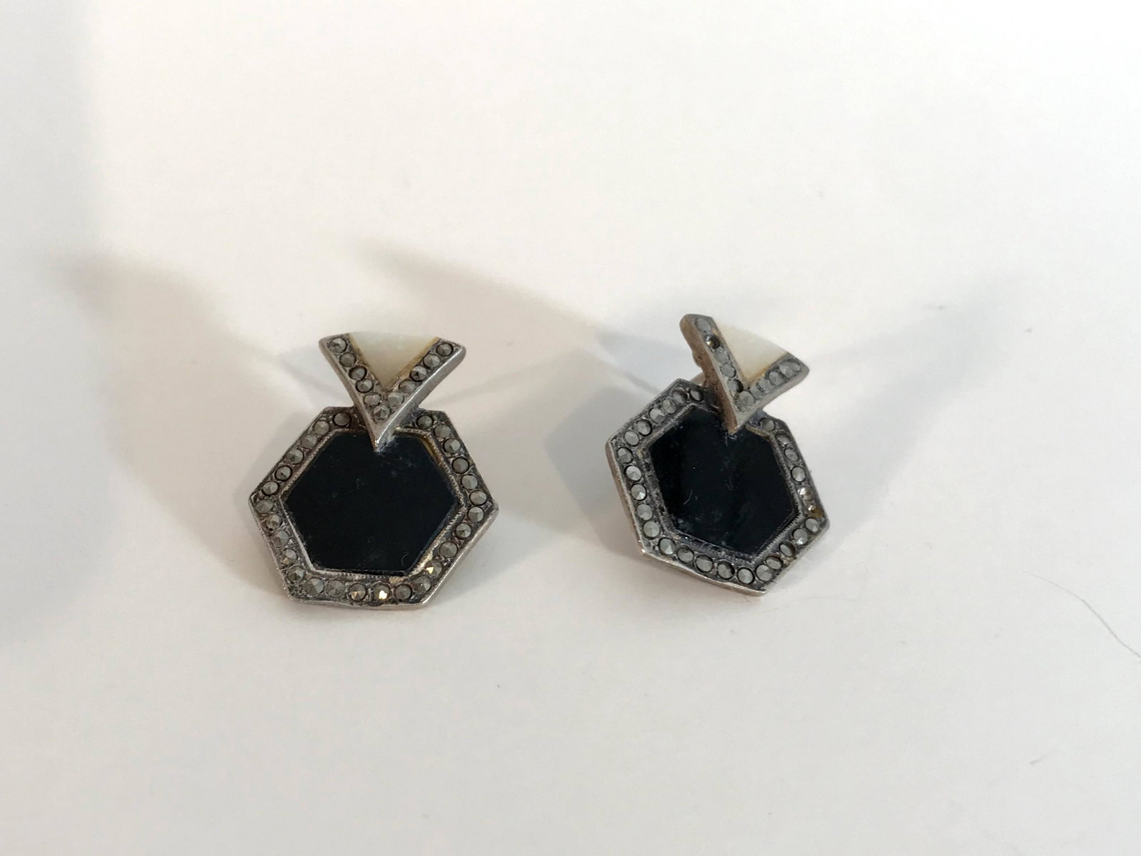 Vintage Sterling Silver And Marcasite Onyx Earrings: Vintage Sterling Silver And Marcasite Onyx Earrings missing 2 stones Please view all photos as they are part of the description and condition of this Item, Feel free to contact me with questions or pi