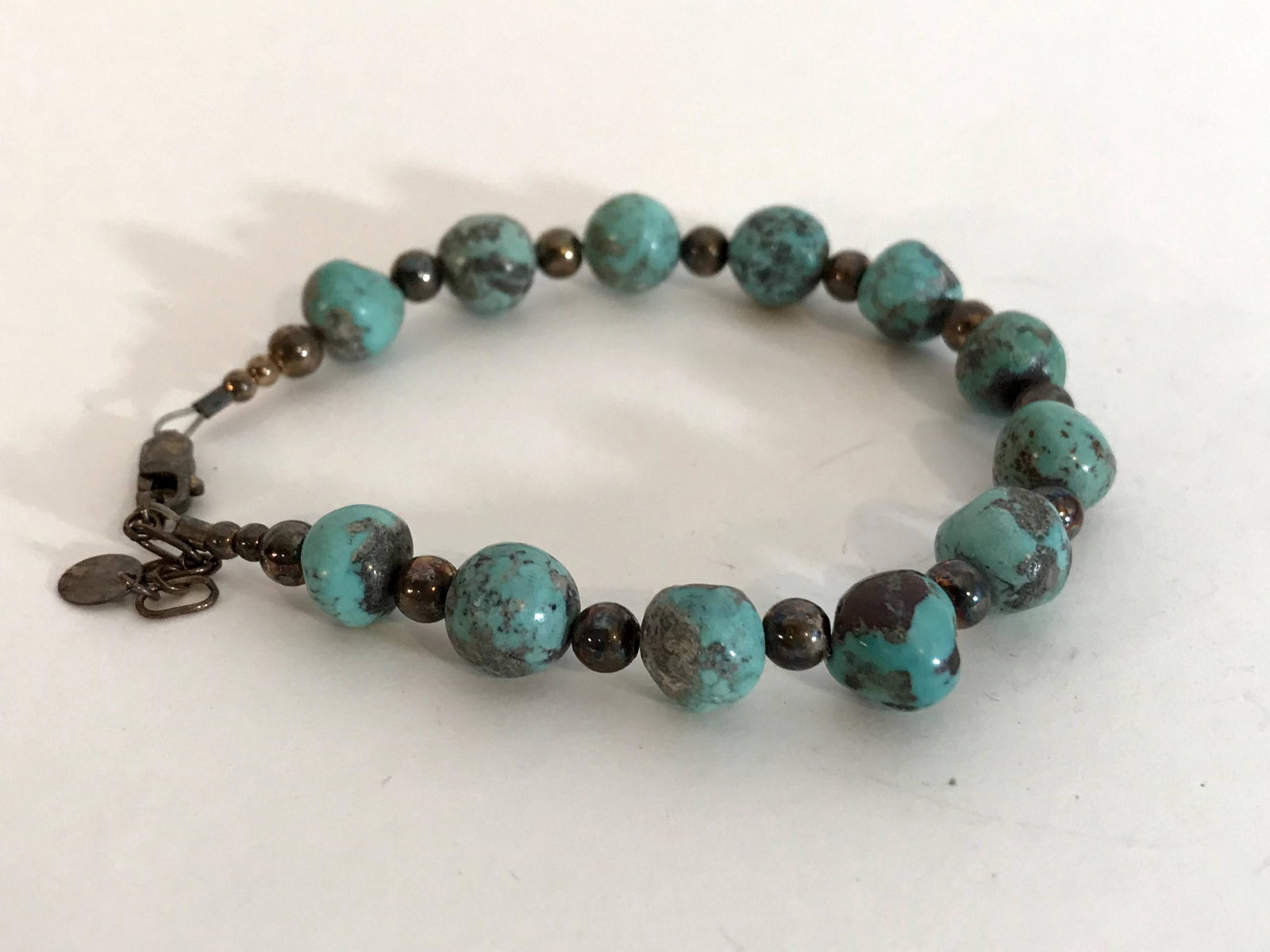 Vintage Sterling Silver Turquoise beaded Bracelet: Vintage Sterling Silver Turquoise beaded Bracelet Please view all photos as they are part of the description and condition of this Item, Feel free to contact me with questions or picture requests! Use